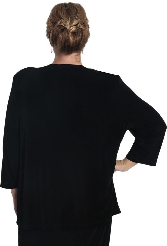 Person wearing a black outfit with a plain background