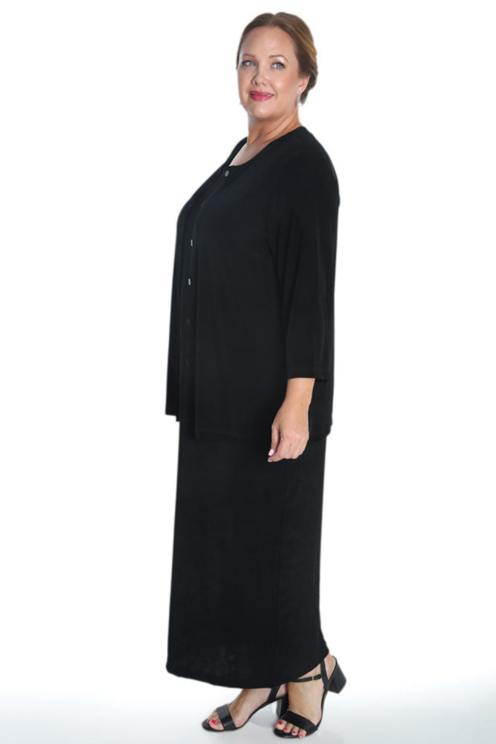 Woman wearing a black outfit on a white background