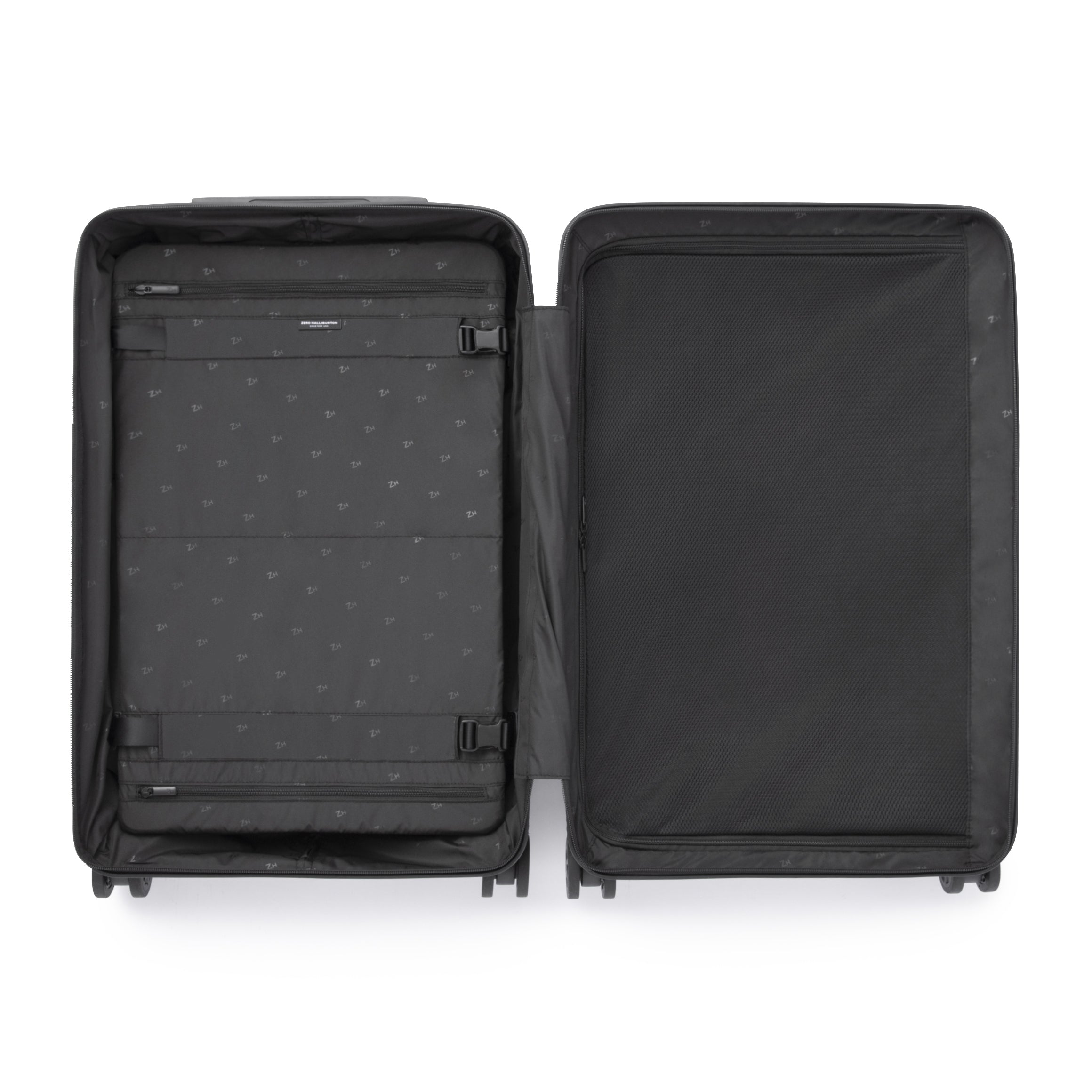 Black suitcase with open compartment on a white background