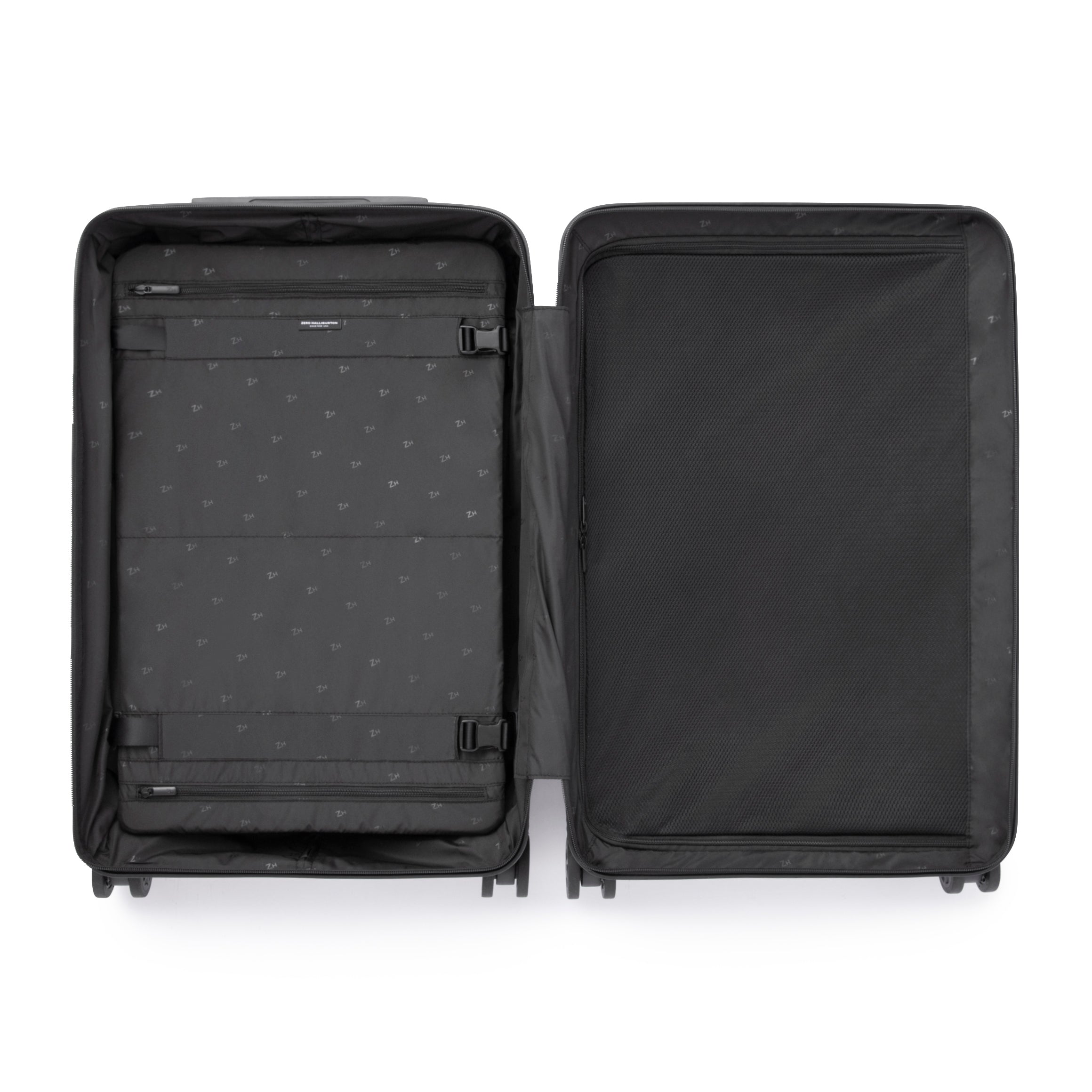 Black suitcase with open compartment on a white background
