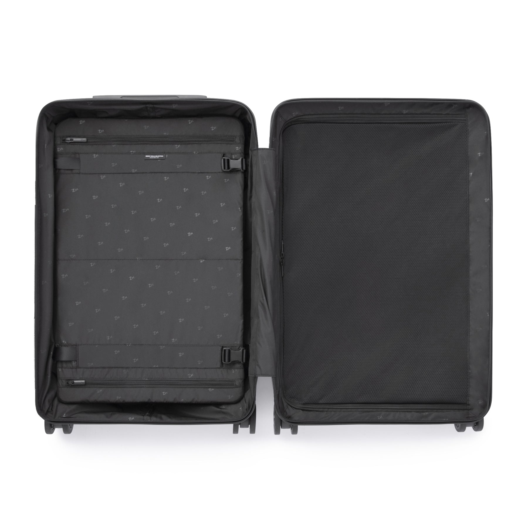 Black suitcase with open compartment on a white background