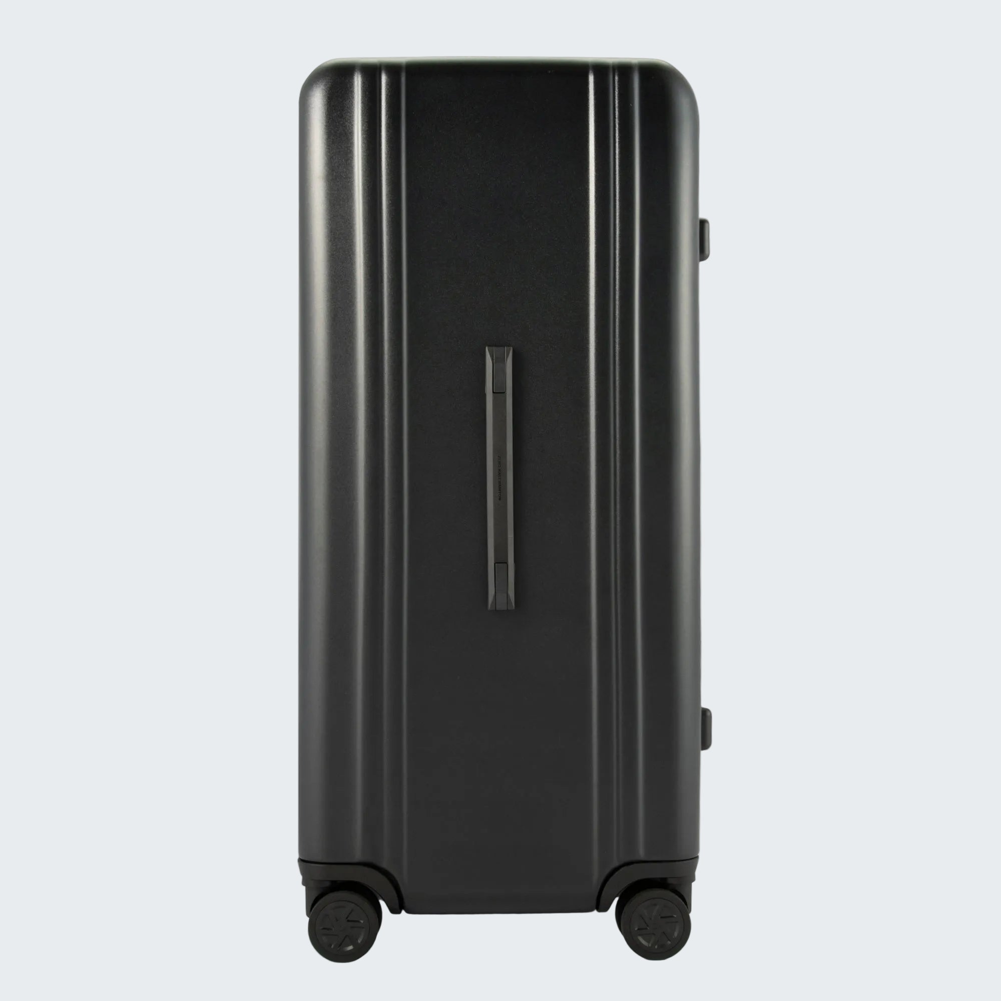 Black suitcase with wheels on a white background
