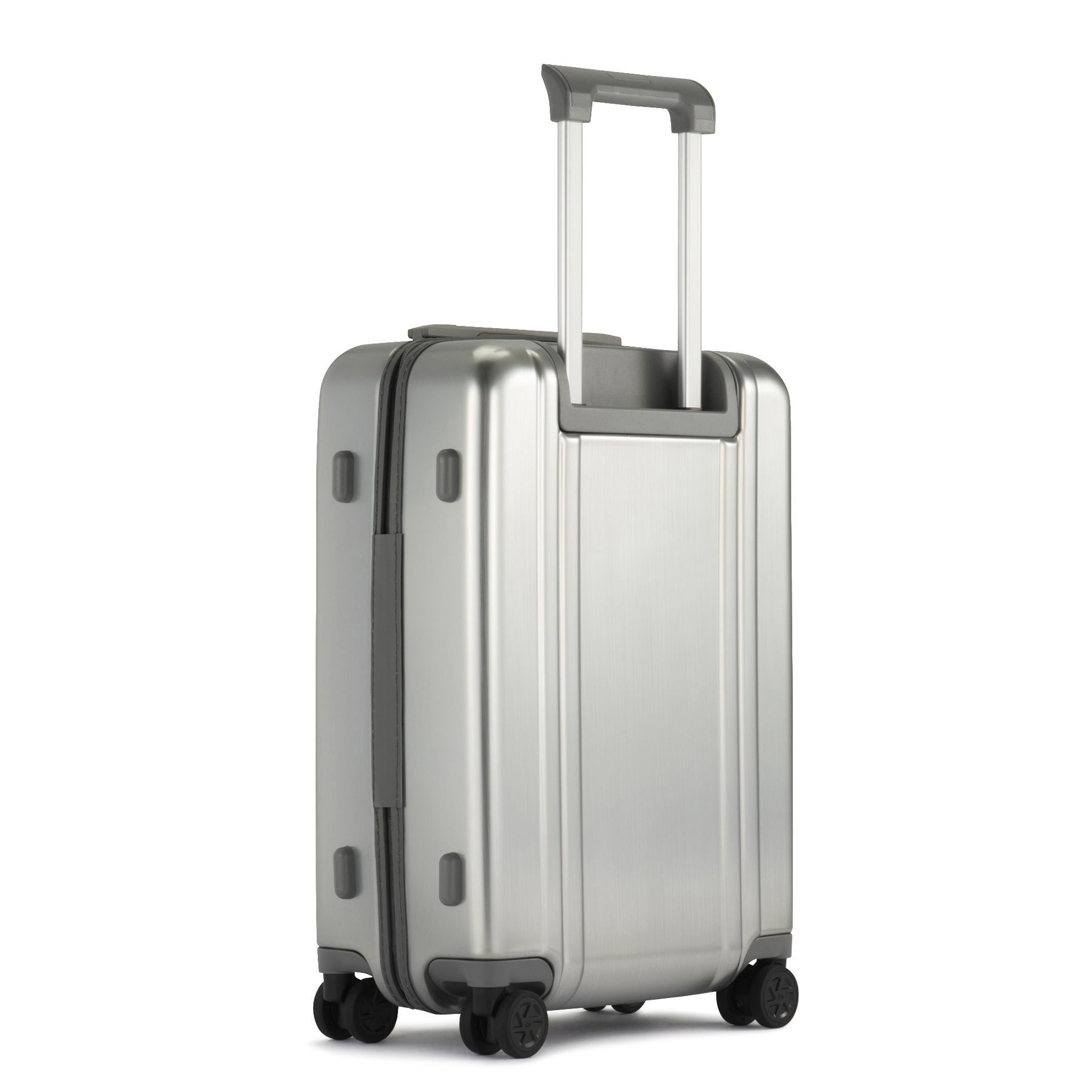 Silver suitcase with wheels and handle on a white background