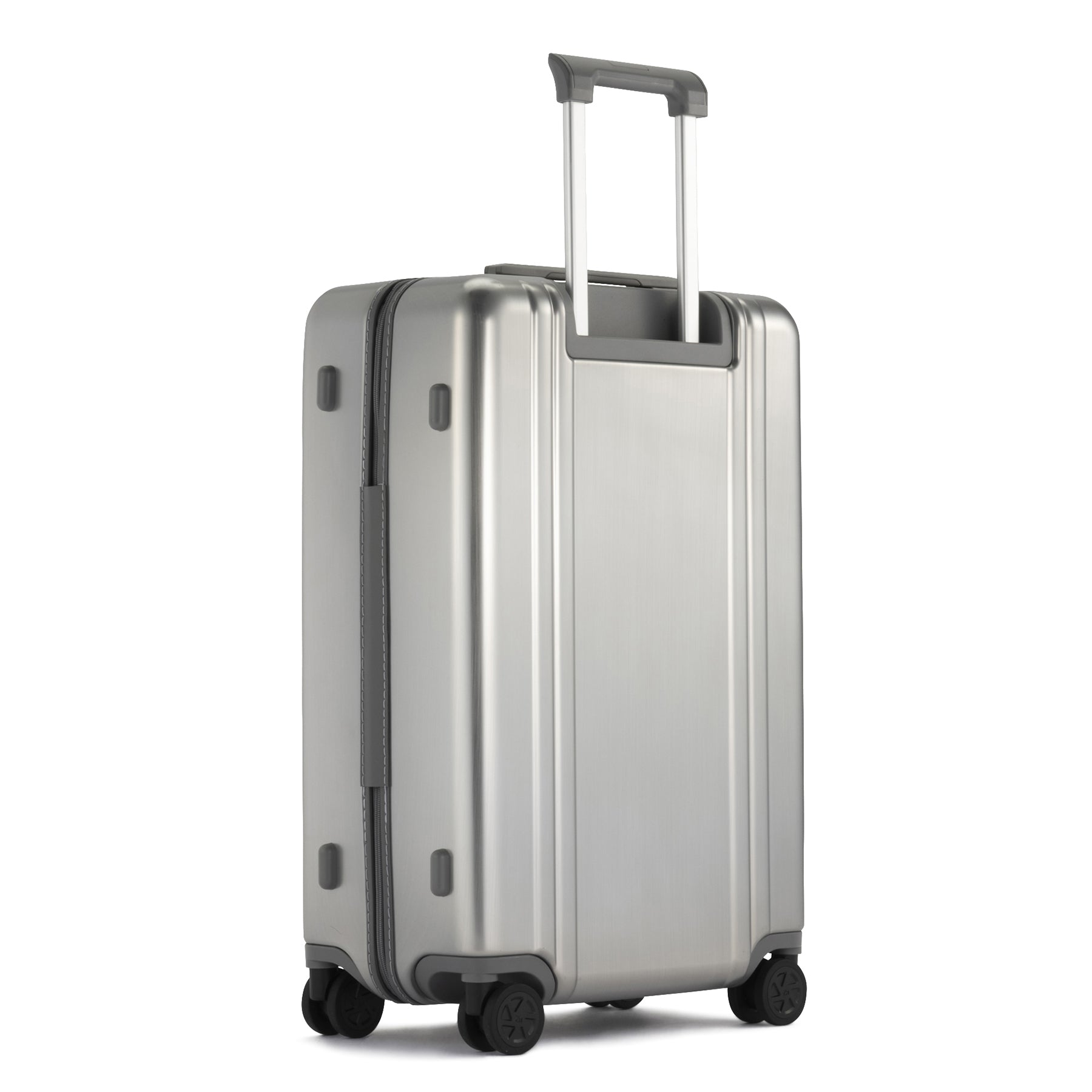 Silver suitcase with wheels and handle on a white background