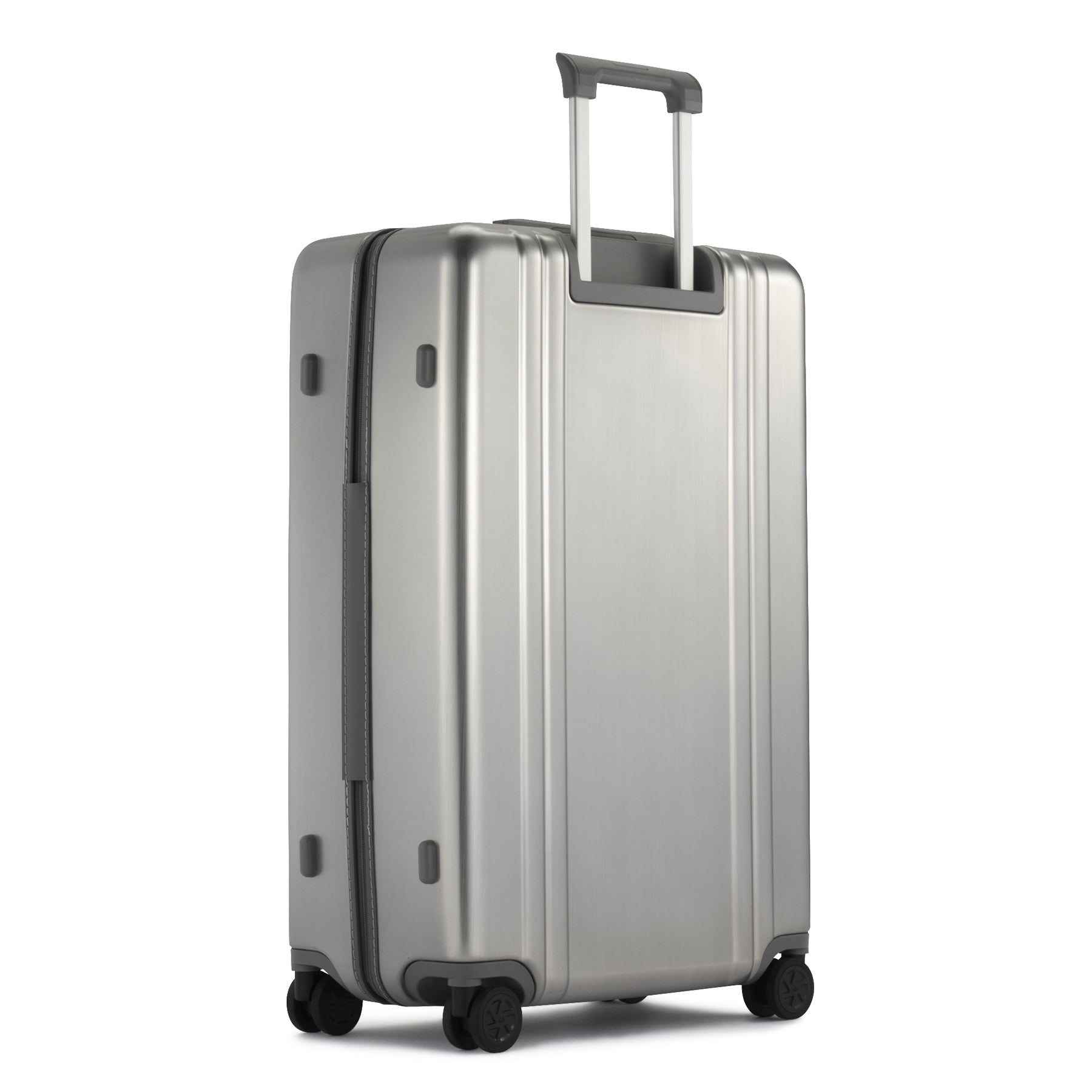 Silver suitcase with wheels and handle on a white background