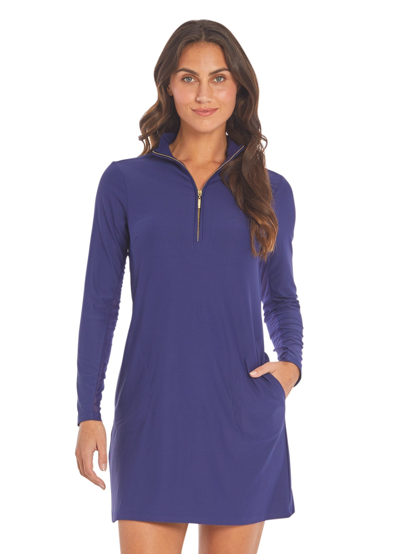 Woman wearing a purple long-sleeve dress with a zipper on a white background