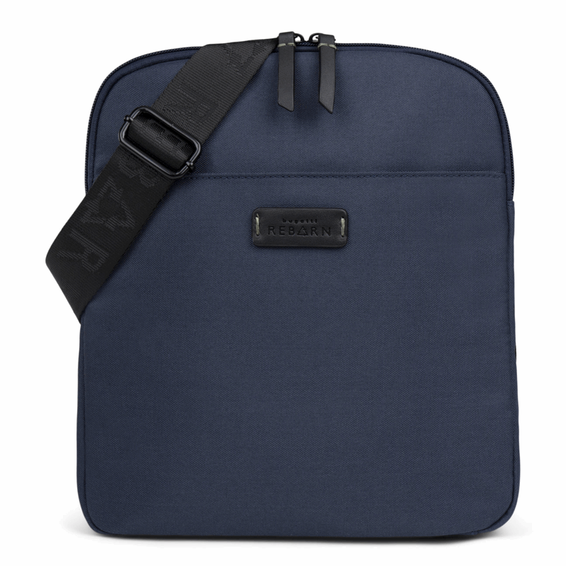 Navy blue shoulder bag with a black strap on a white background