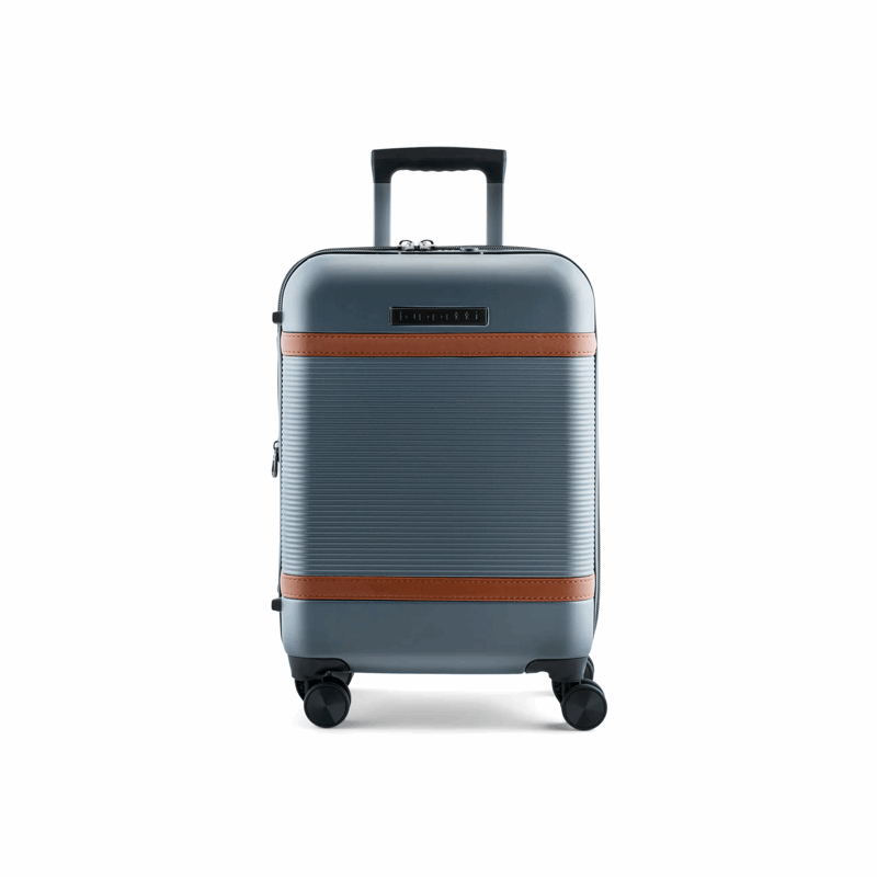 Gray suitcase with a brown stripe on a white background