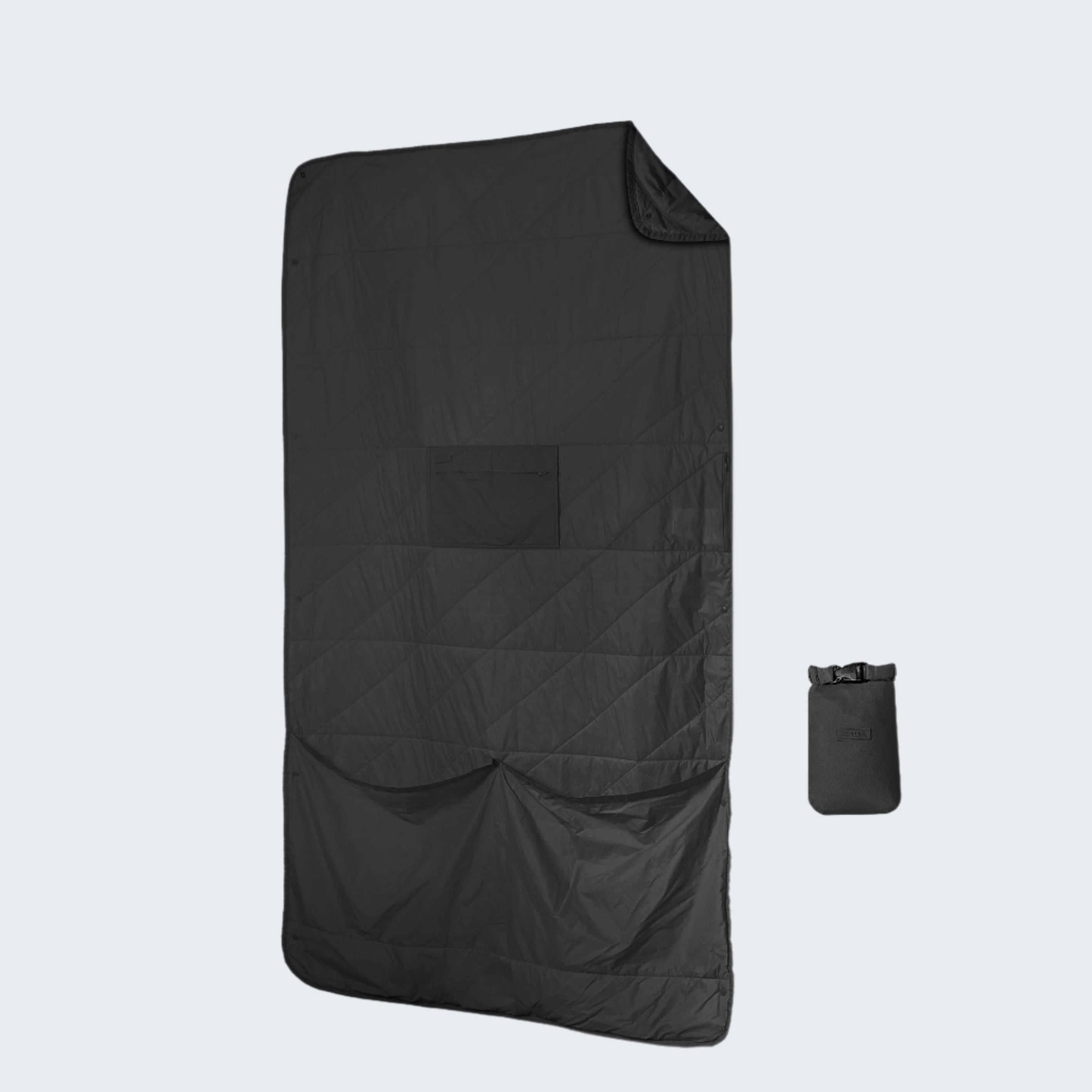 Black quilted cover with a small black bag on a white background