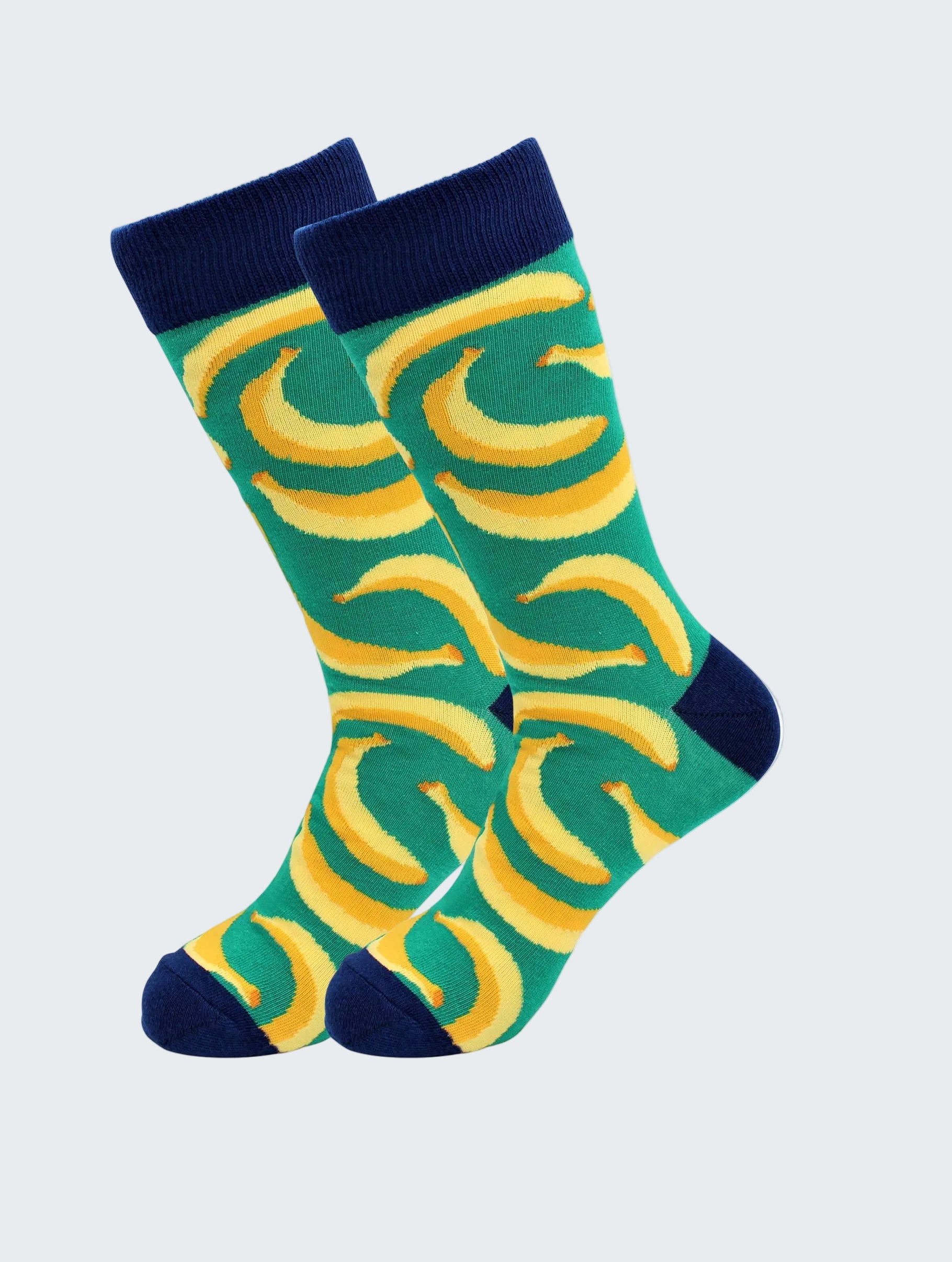 Pair of socks with banana pattern on a white background