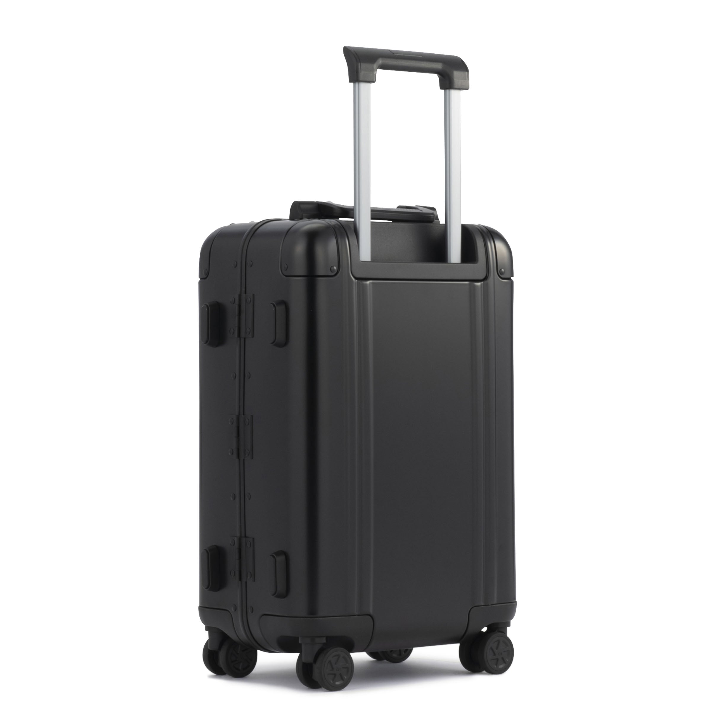 Black suitcase with wheels and a handle on a white background