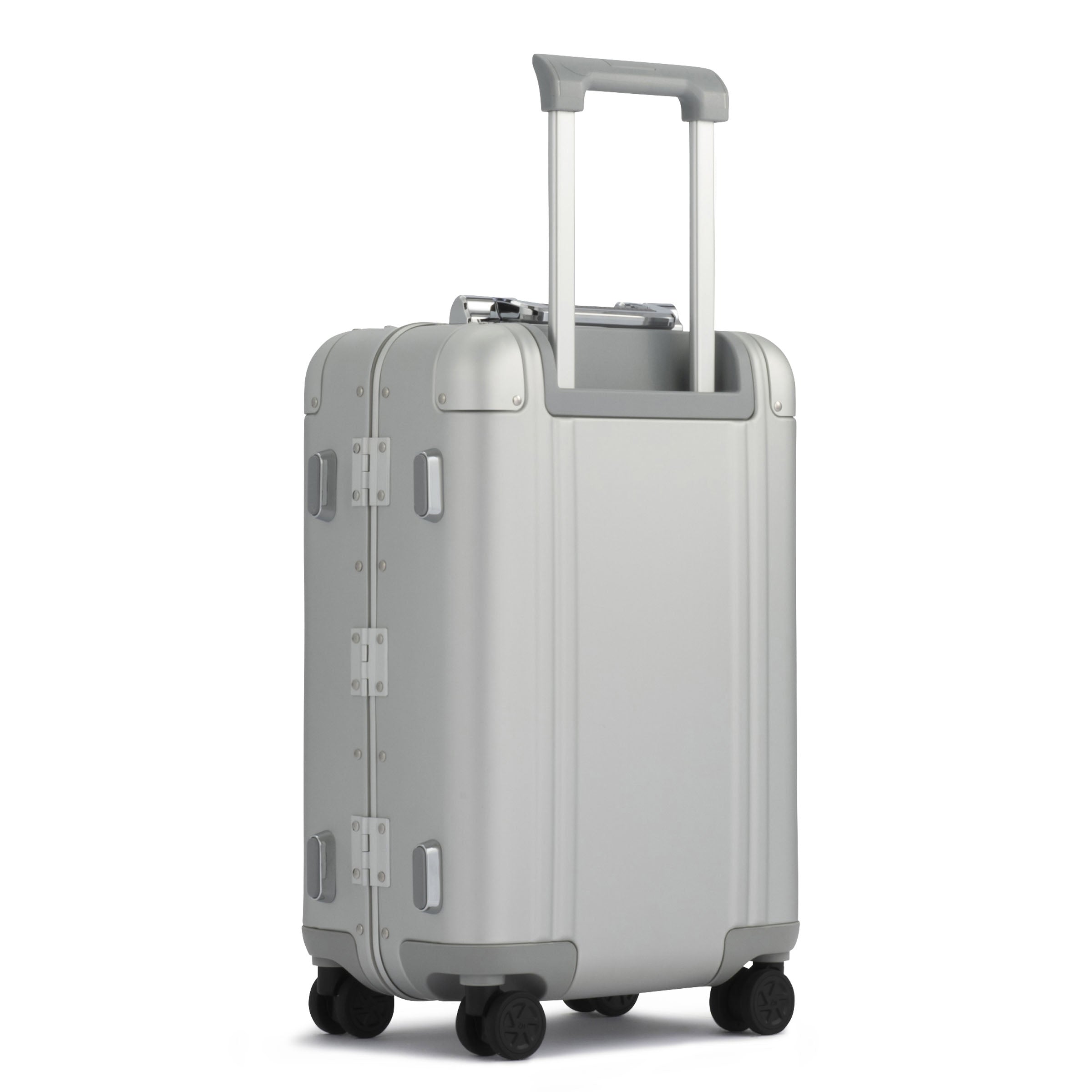 Silver suitcase with wheels on a white background