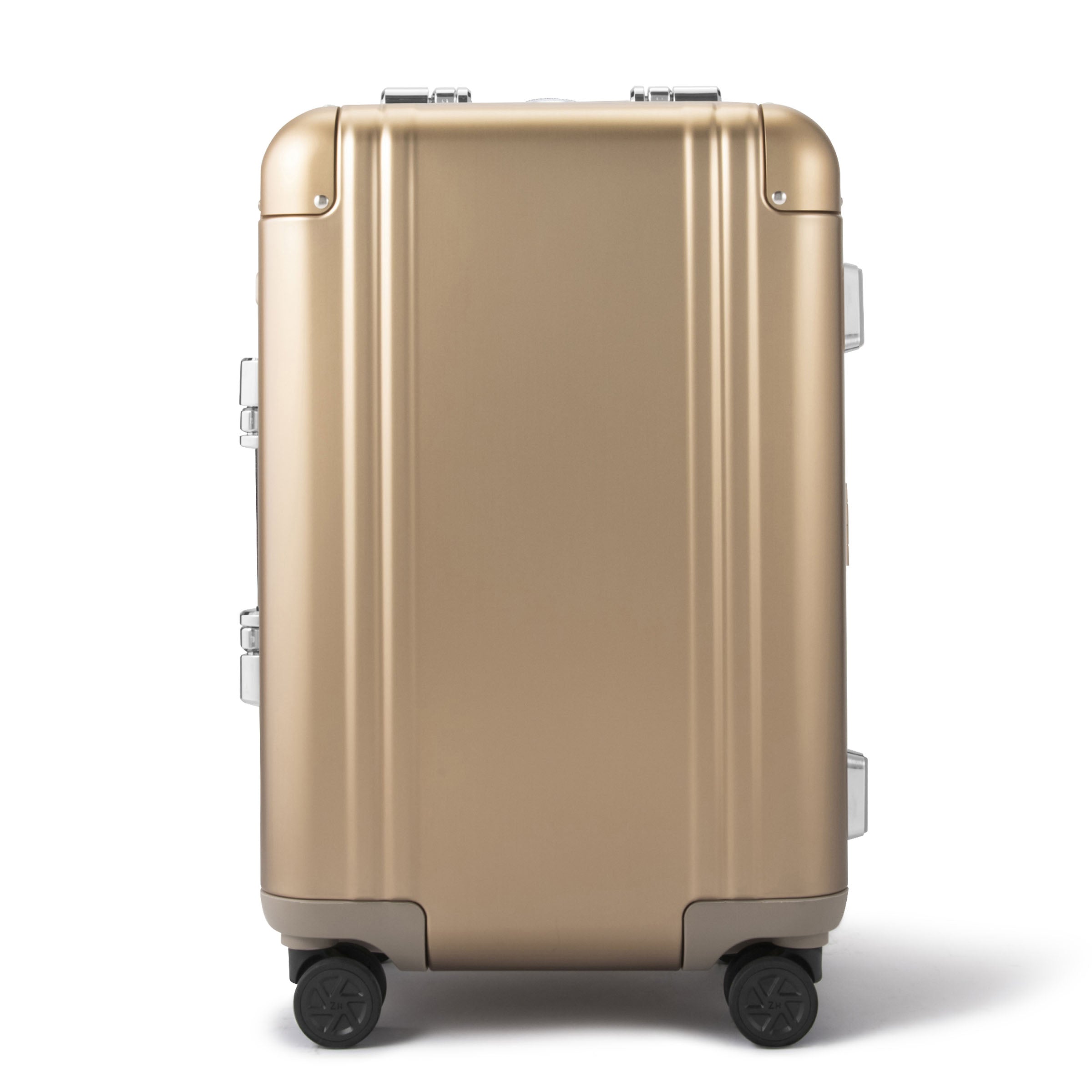 Gold suitcase with wheels on a white background