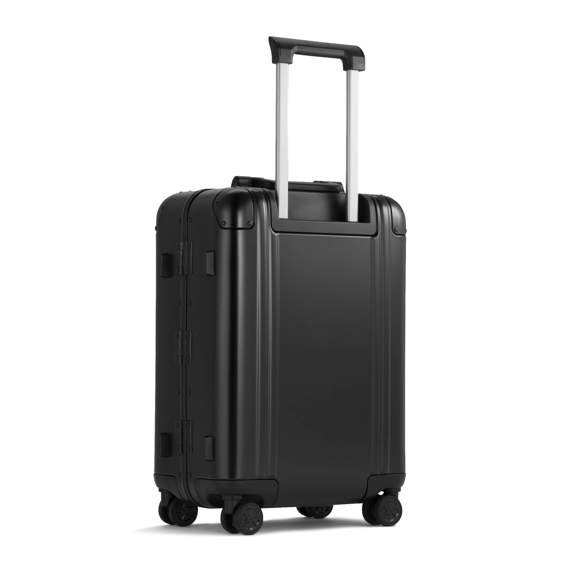 Black suitcase with wheels and handle on a white background