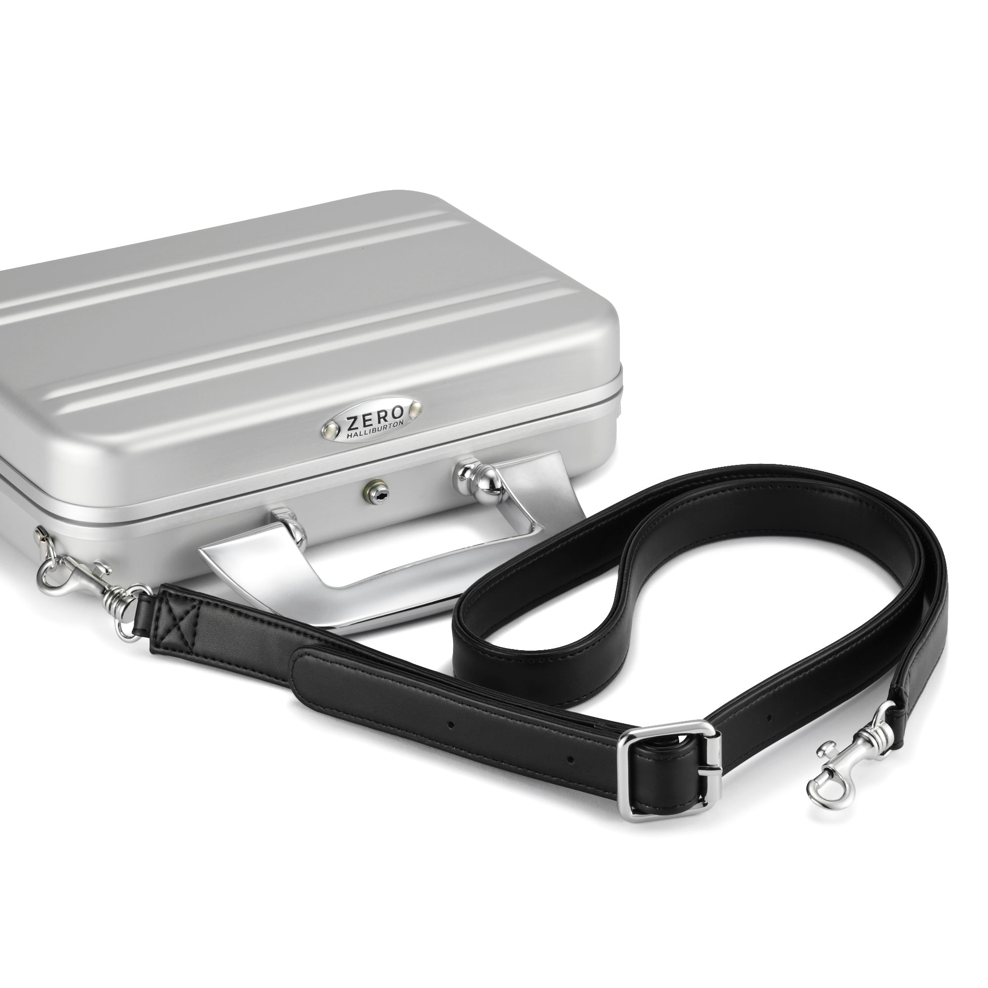 Silver briefcase with a black strap on a white background
