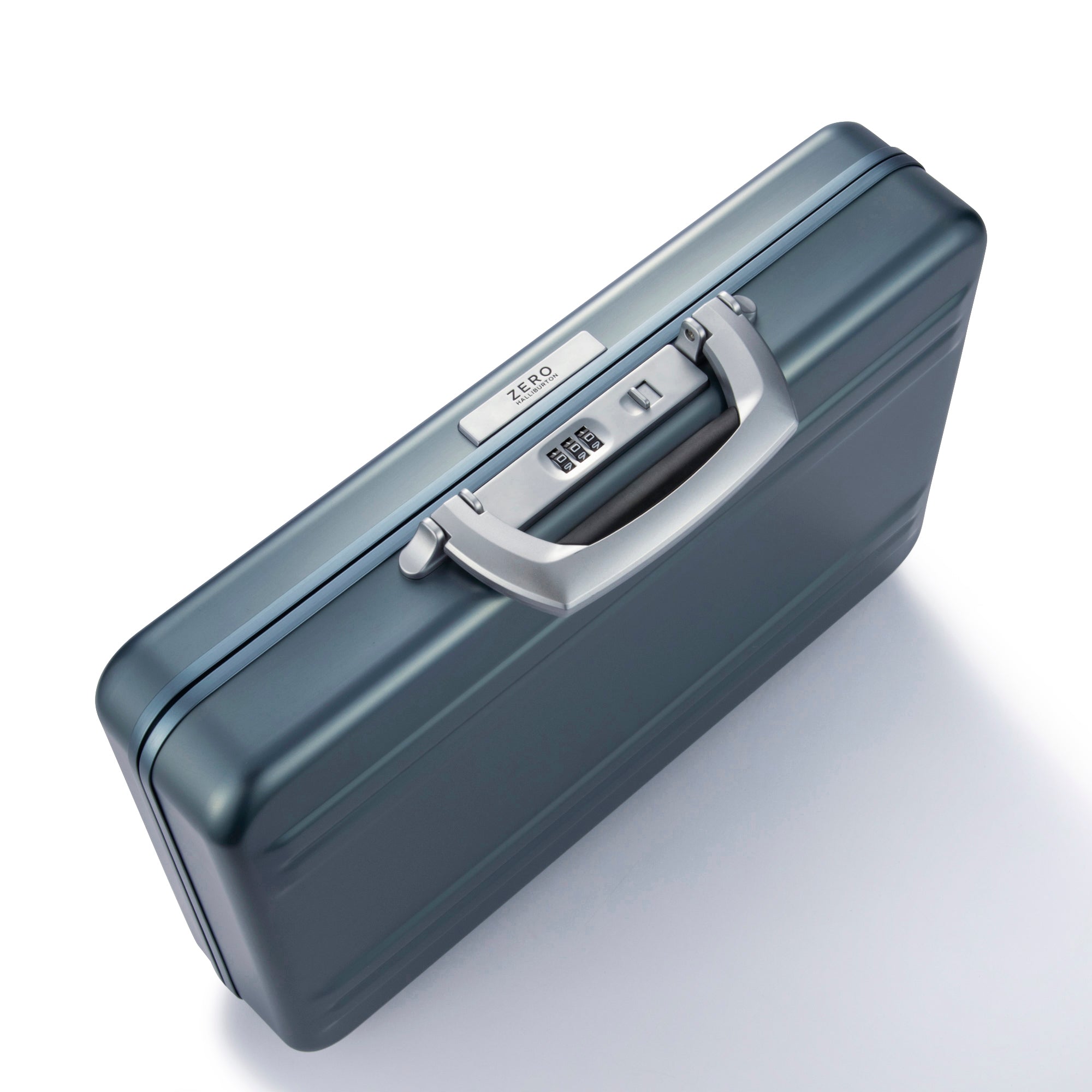 Blue suitcase with a silver handle on a white background