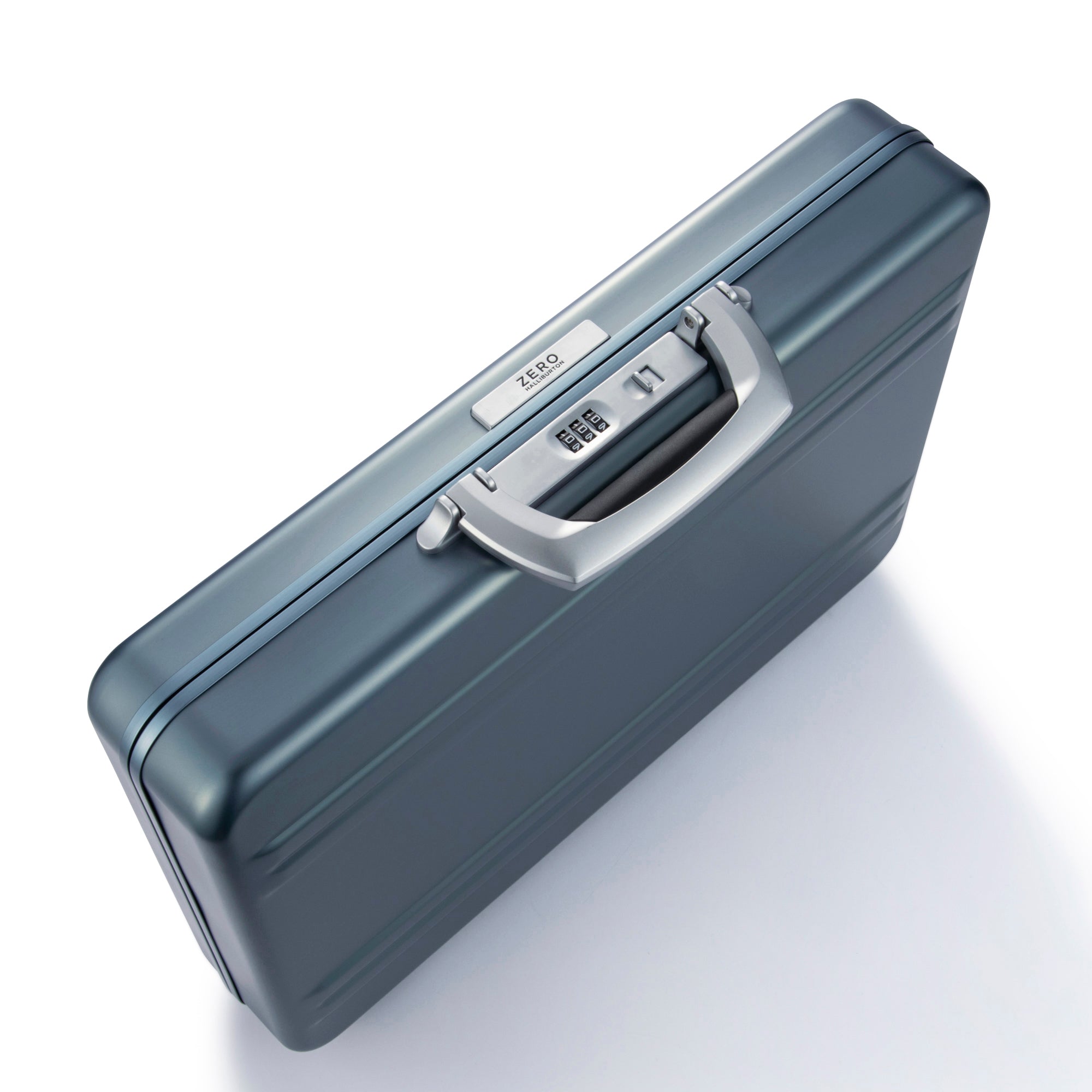 Blue suitcase with a silver handle on a white background