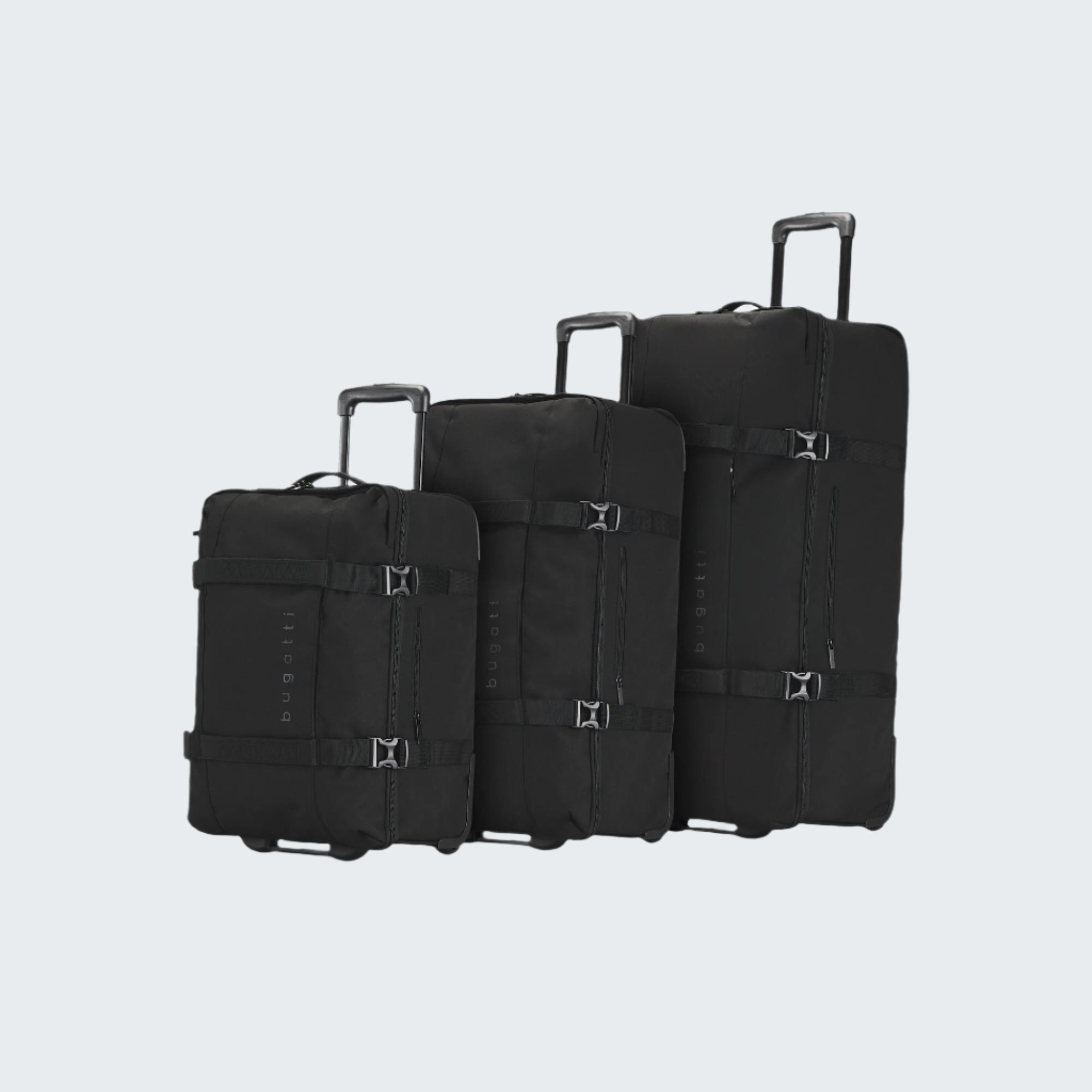 Set of three black suitcases of different sizes on a white background