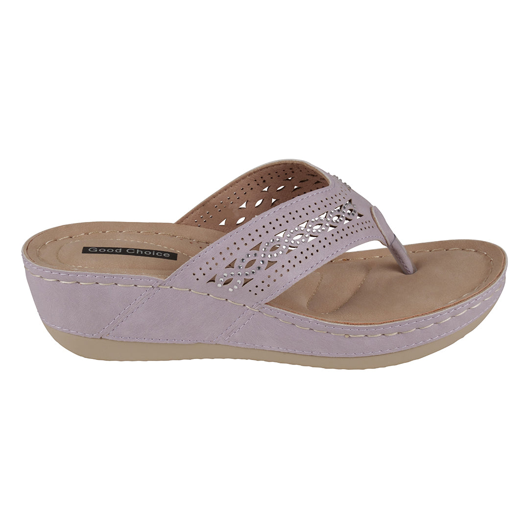 Light purple wedge sandal with beige sole on a white background