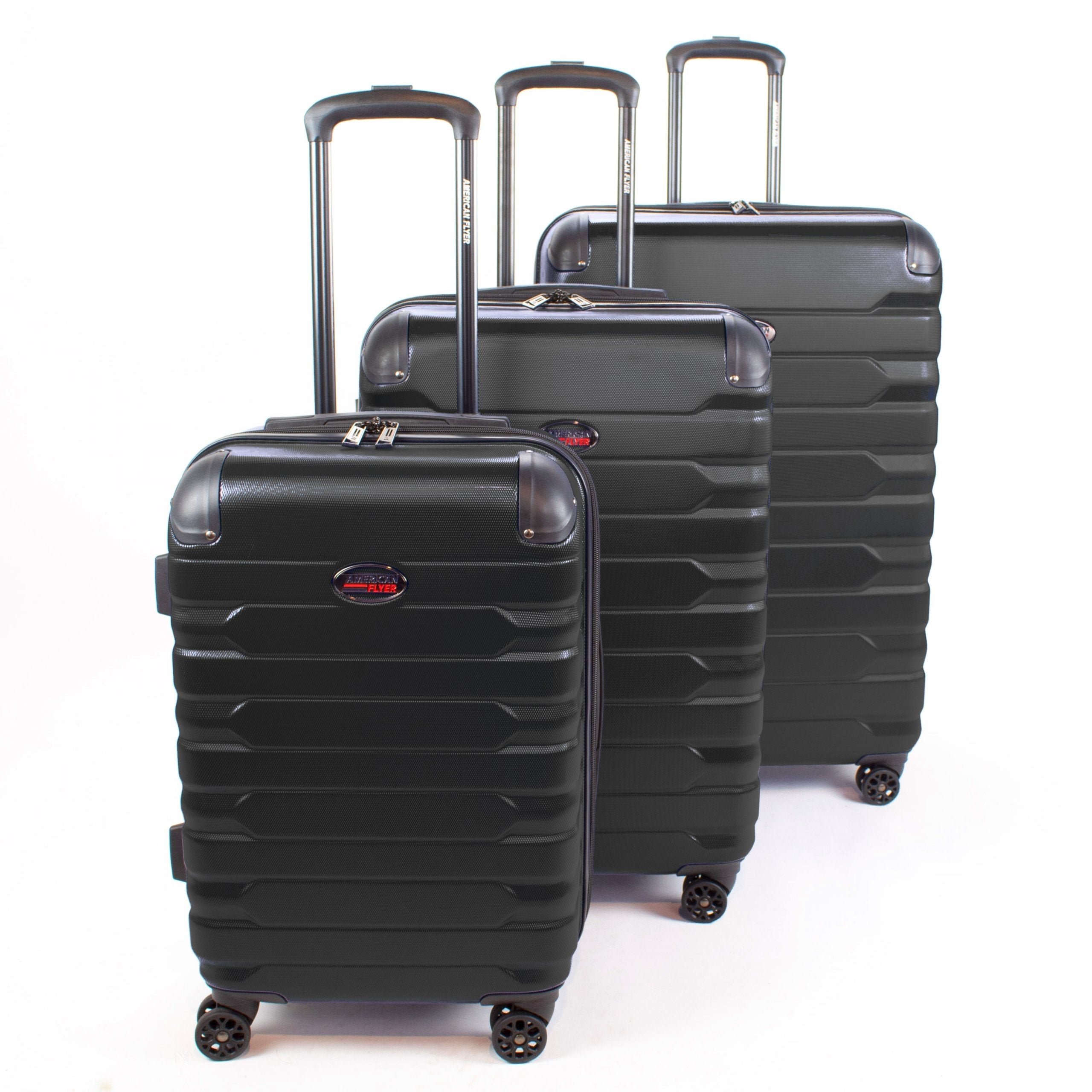 Set of three black suitcases with visible brand logo on a white background