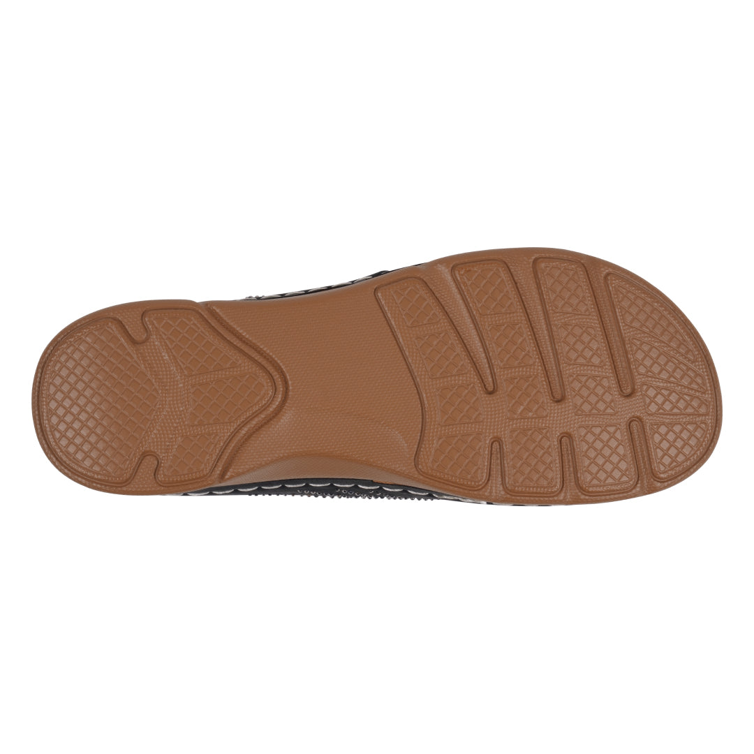 Brown sole of a shoe on a white background