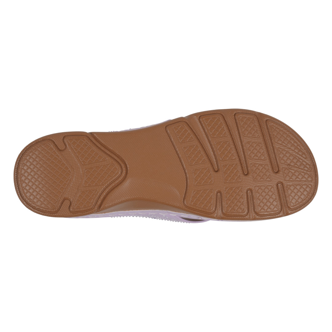 Brown sole of a shoe on a white background