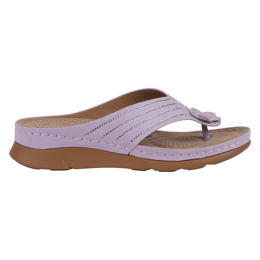 Purple sandal with a brown sole on a white background