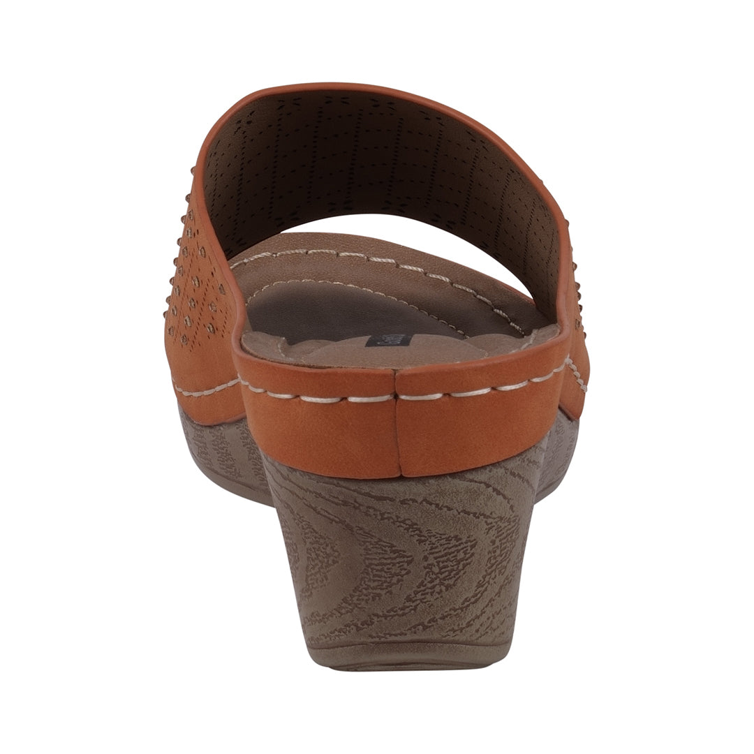 Brown sandal with tan strap on a white background