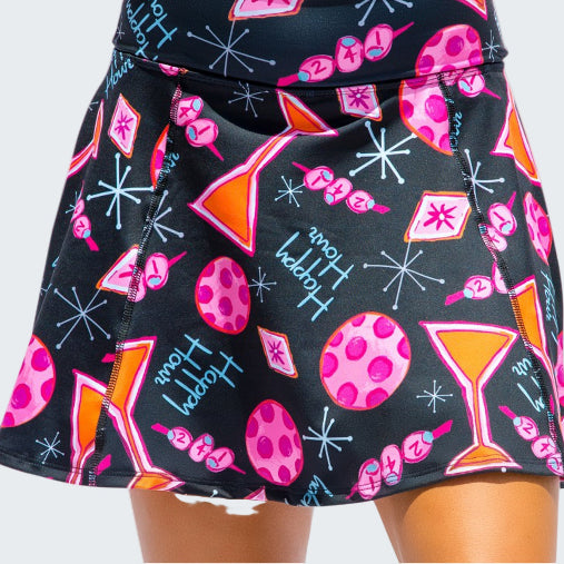 Skirt with colorful cocktail-themed pattern on a black background
