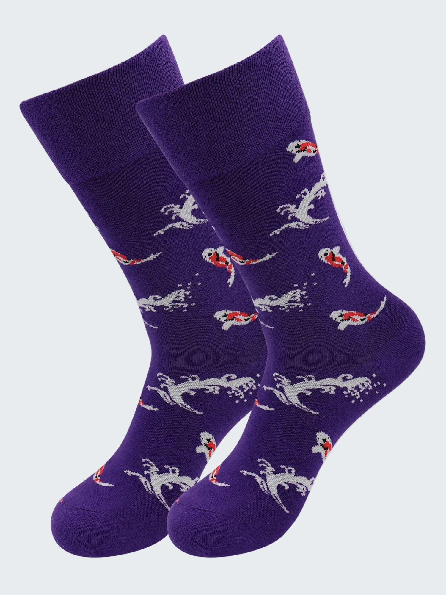 Purple socks with mermaid pattern on a white background