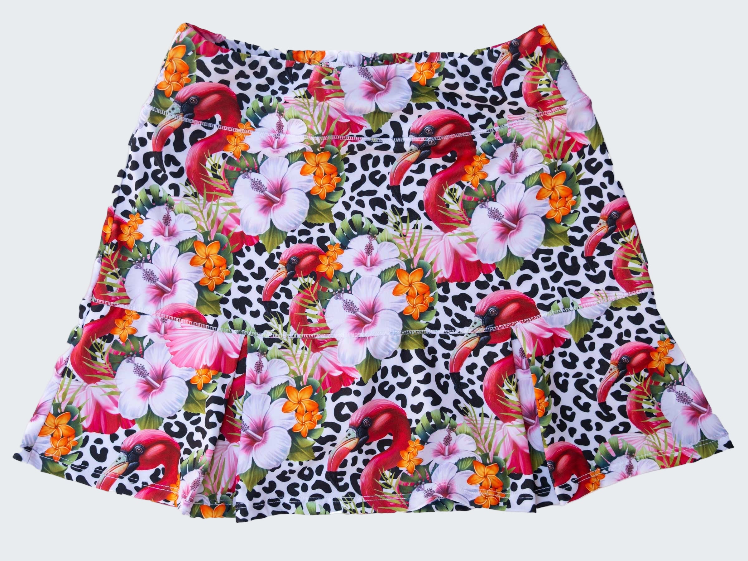 Skirt with flamingo and floral pattern on a white background