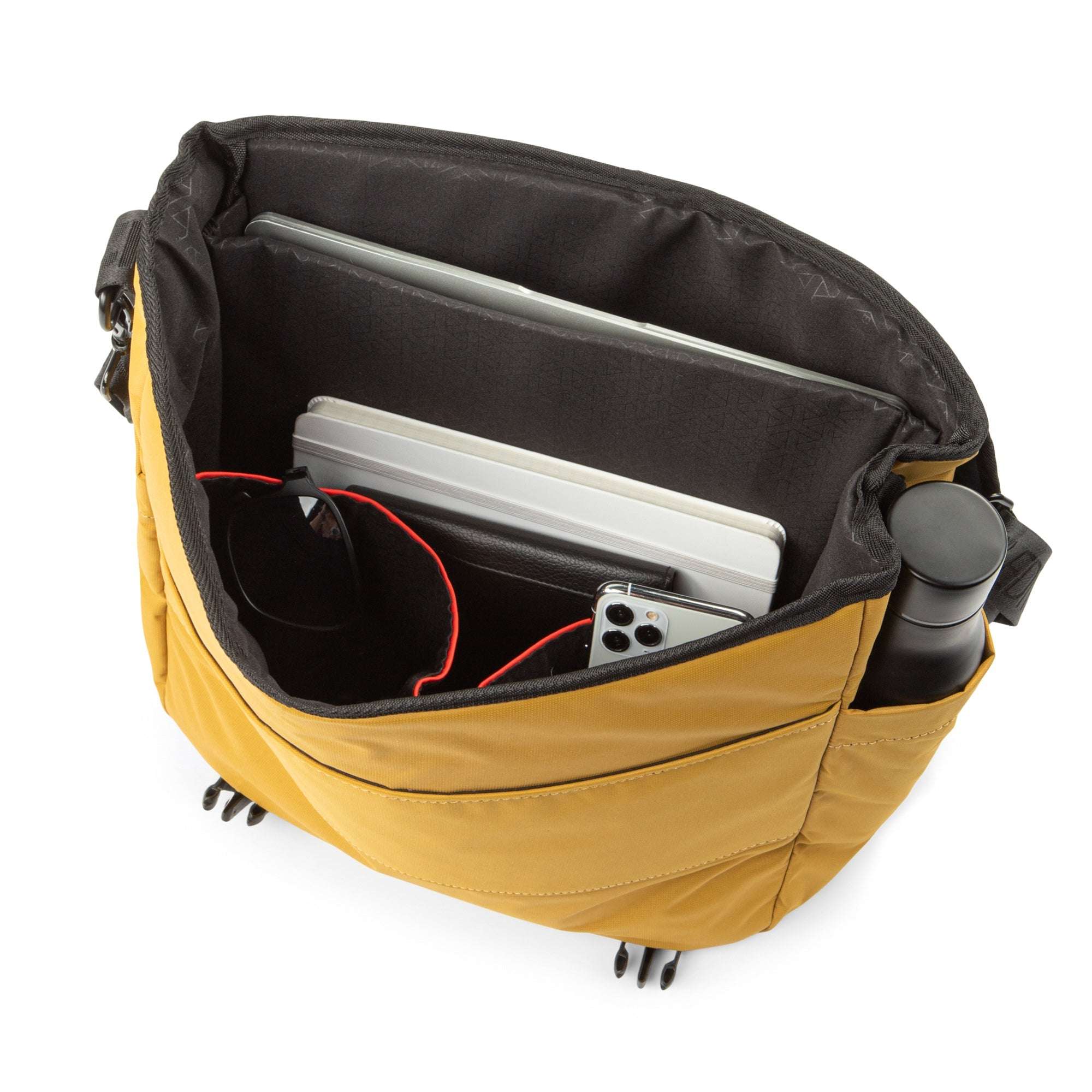 Yellow and black bag with electronic devices inside on a white background