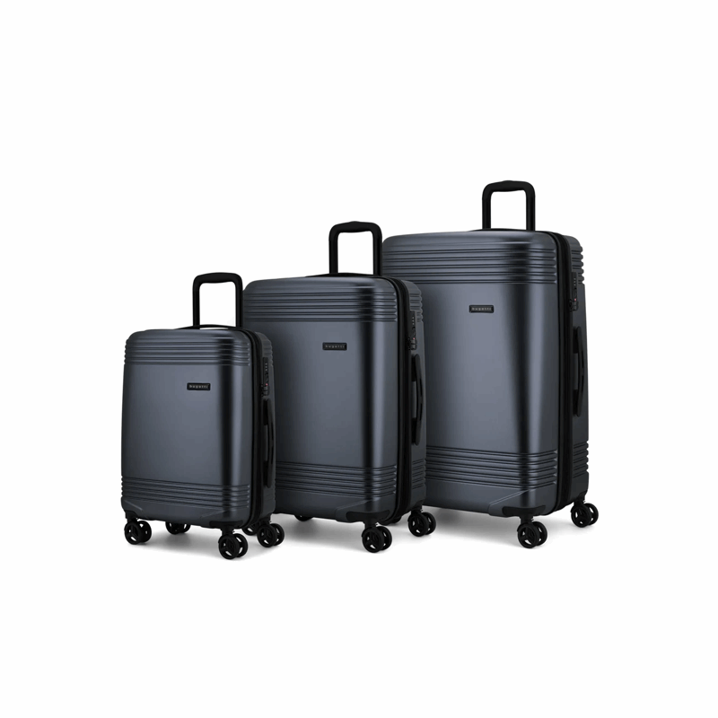 Set of three black suitcases of different sizes on a white background