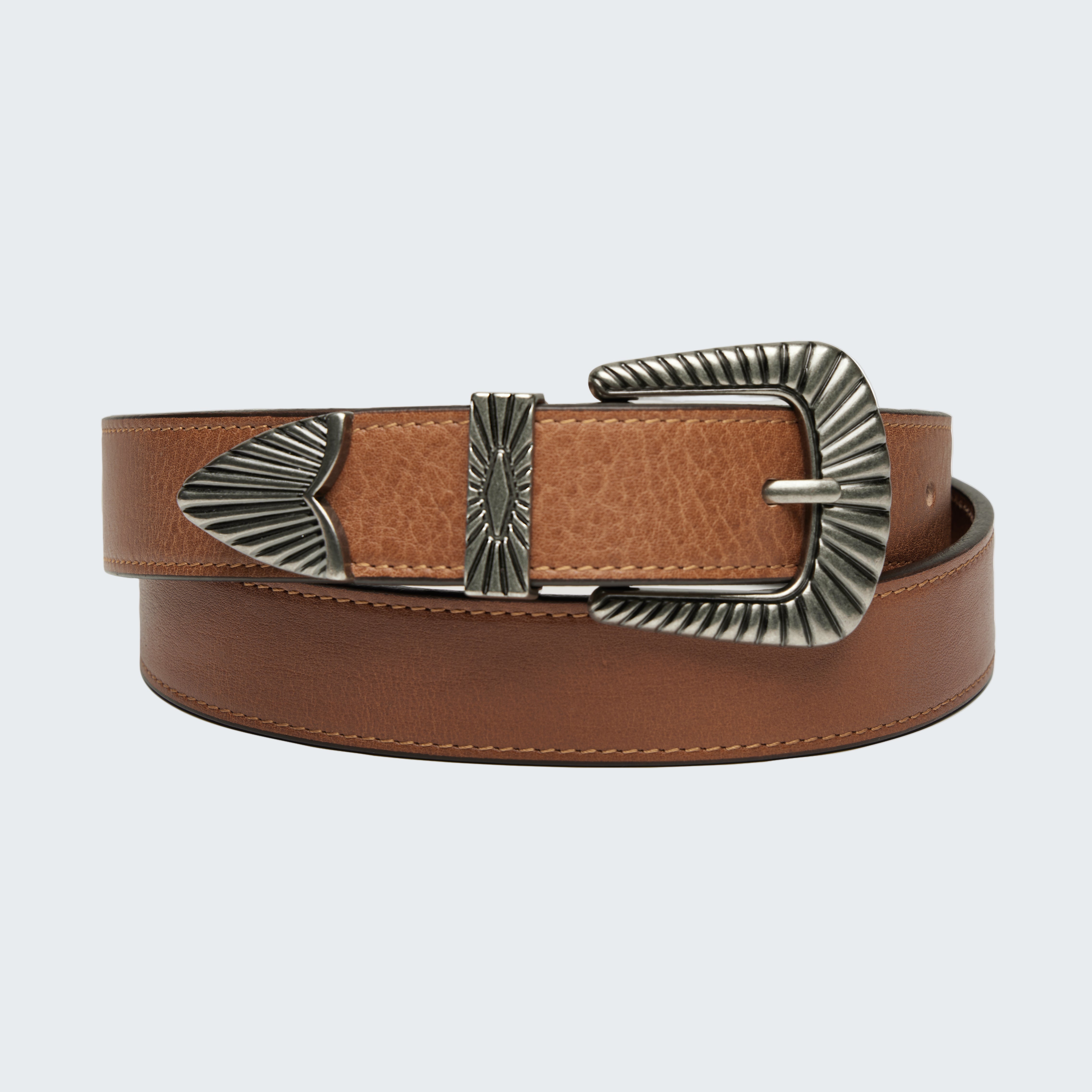 Brown leather belt with a large metallic buckle on a white background