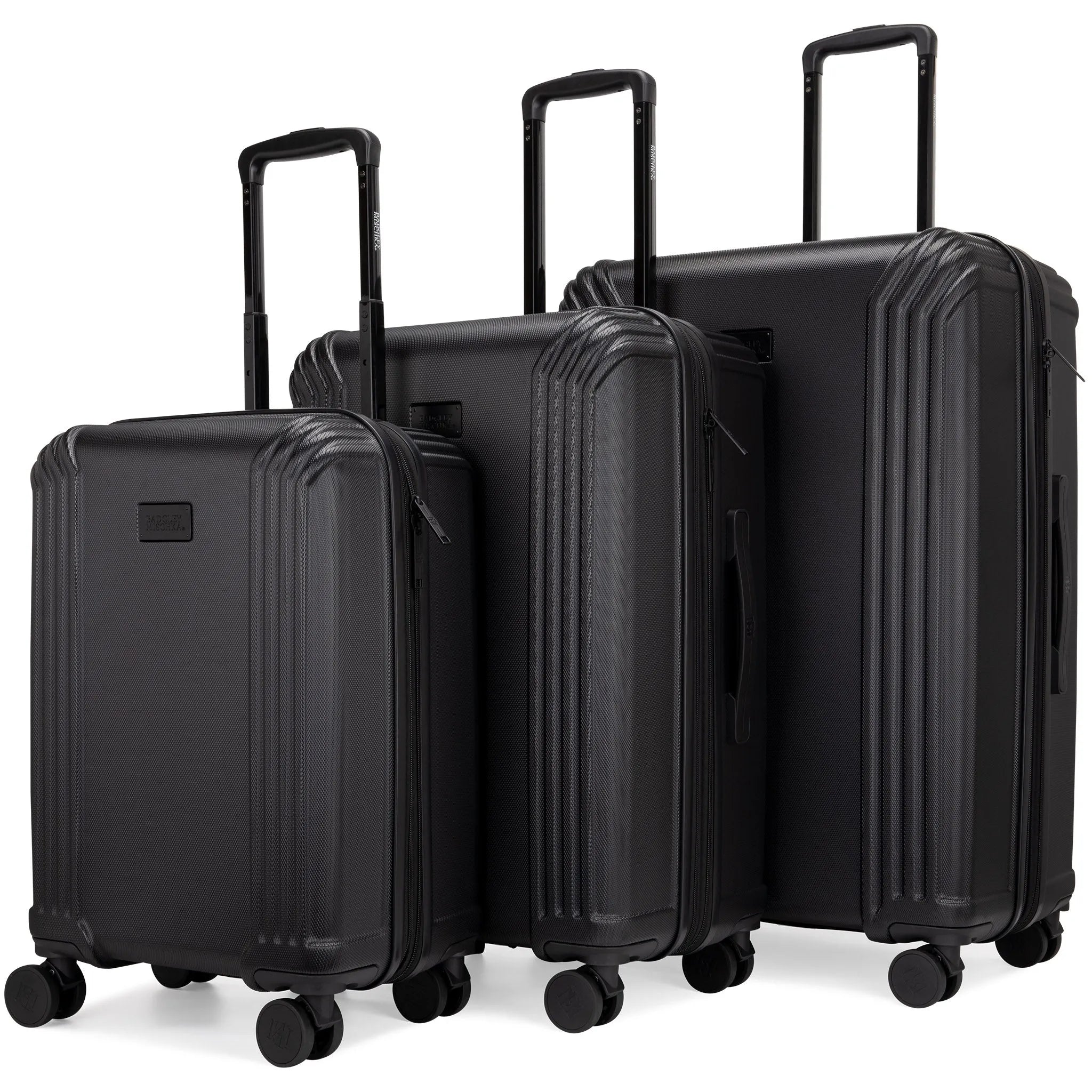 Set of black suitcases of different sizes on a white background