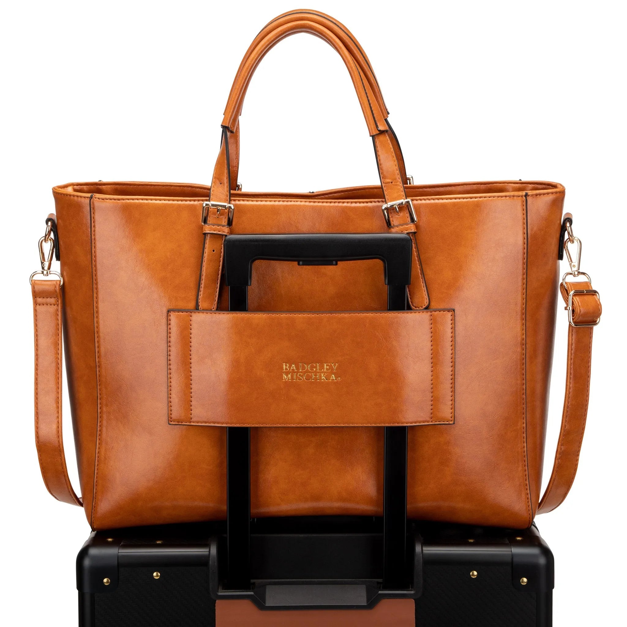 Brown leather handbag with a visible brand logo on a white background