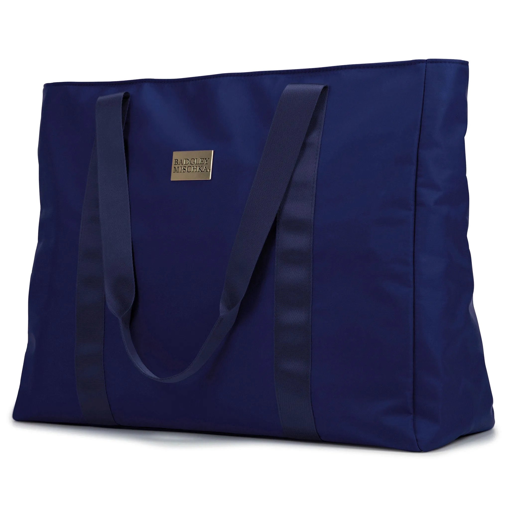 A black nylon tote bag with a shiny gold logo plate, soft webbing straps, and a zippered rear pocket. The bag is displayed in a way that showcases its spacious design and sleek finish.