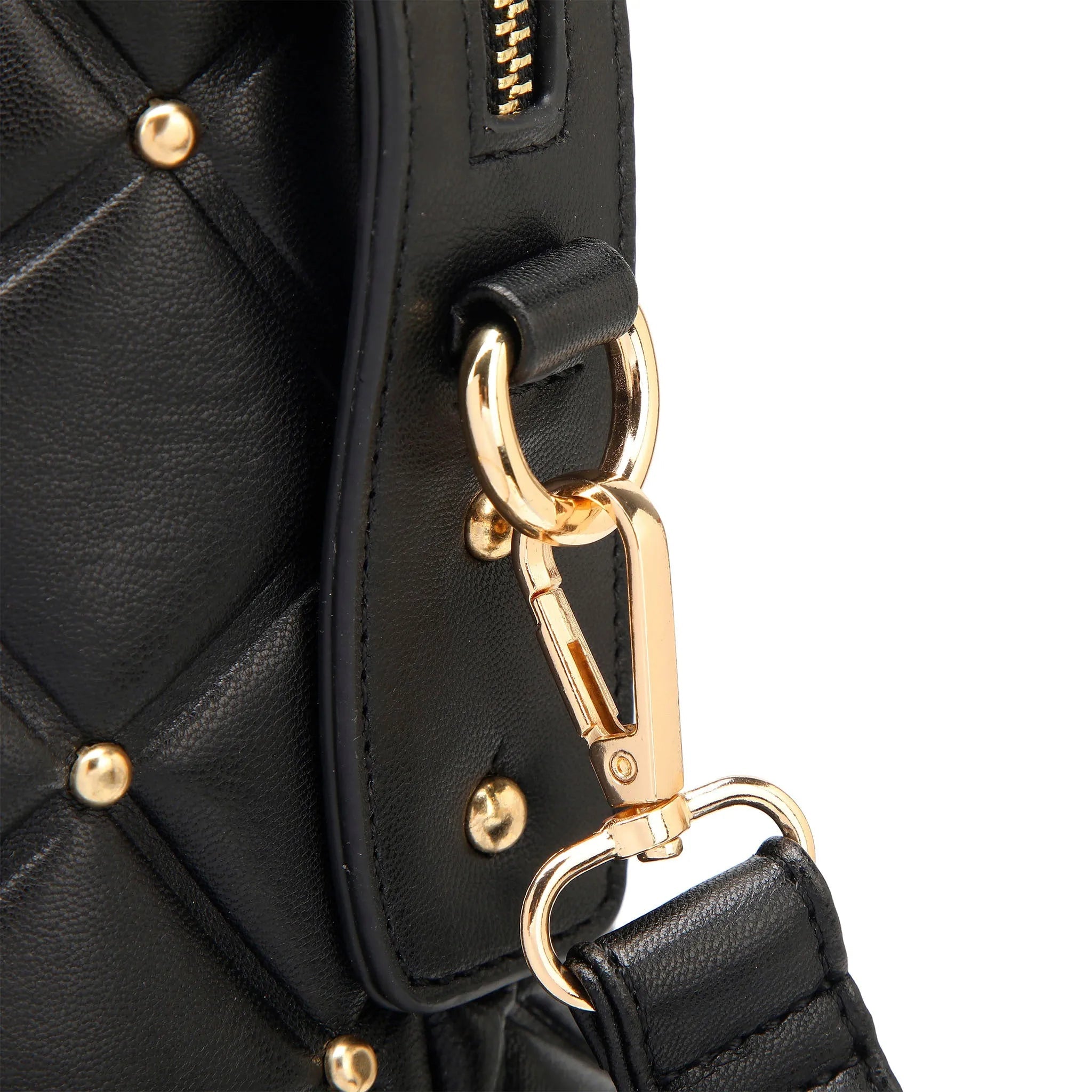 Black quilted handbag with gold hardware on a white background