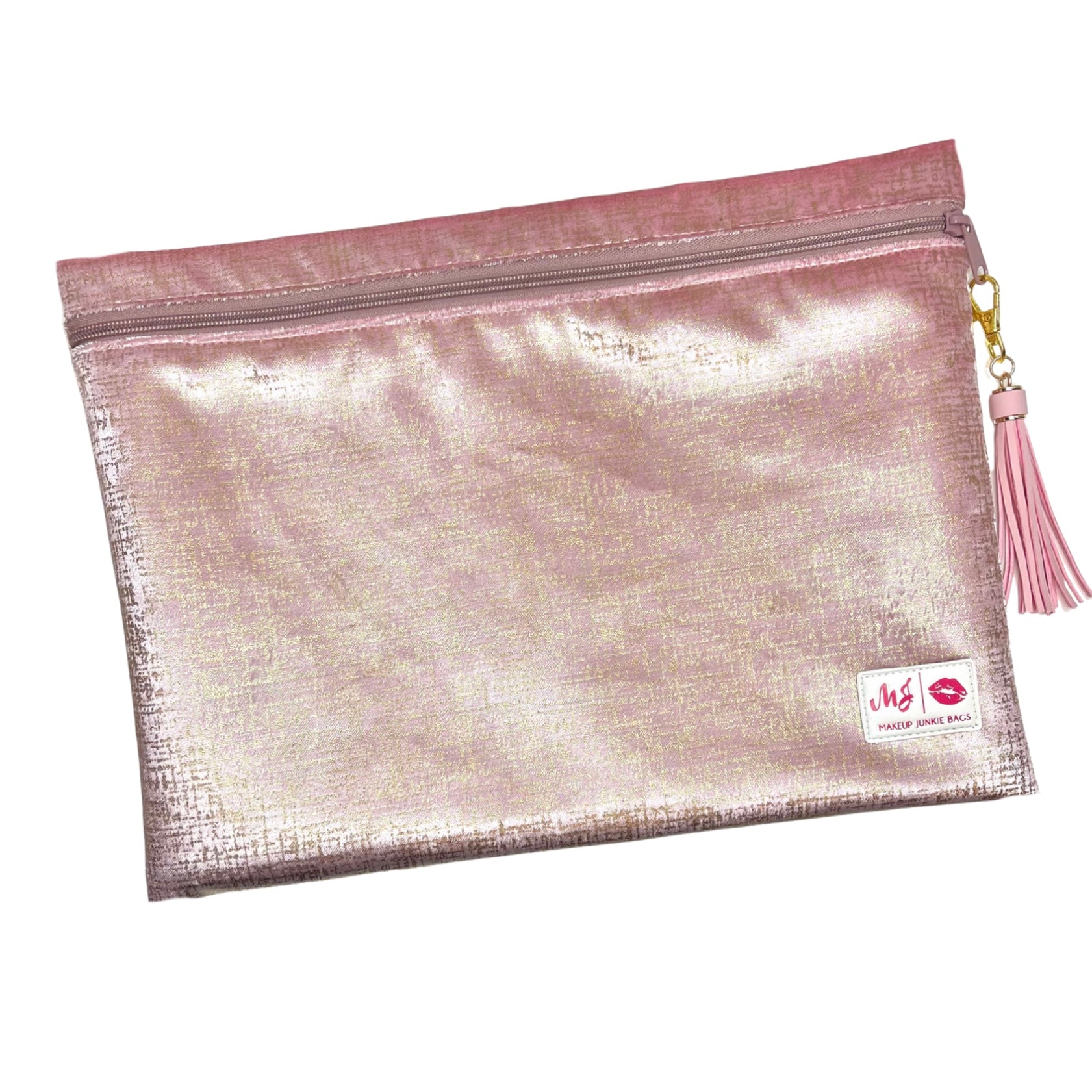 Rose gold pouch with a tassel on a white background