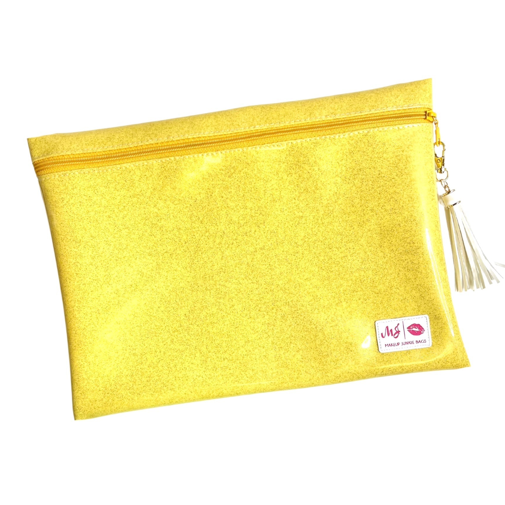 Yellow pouch with a tassel on a white background
