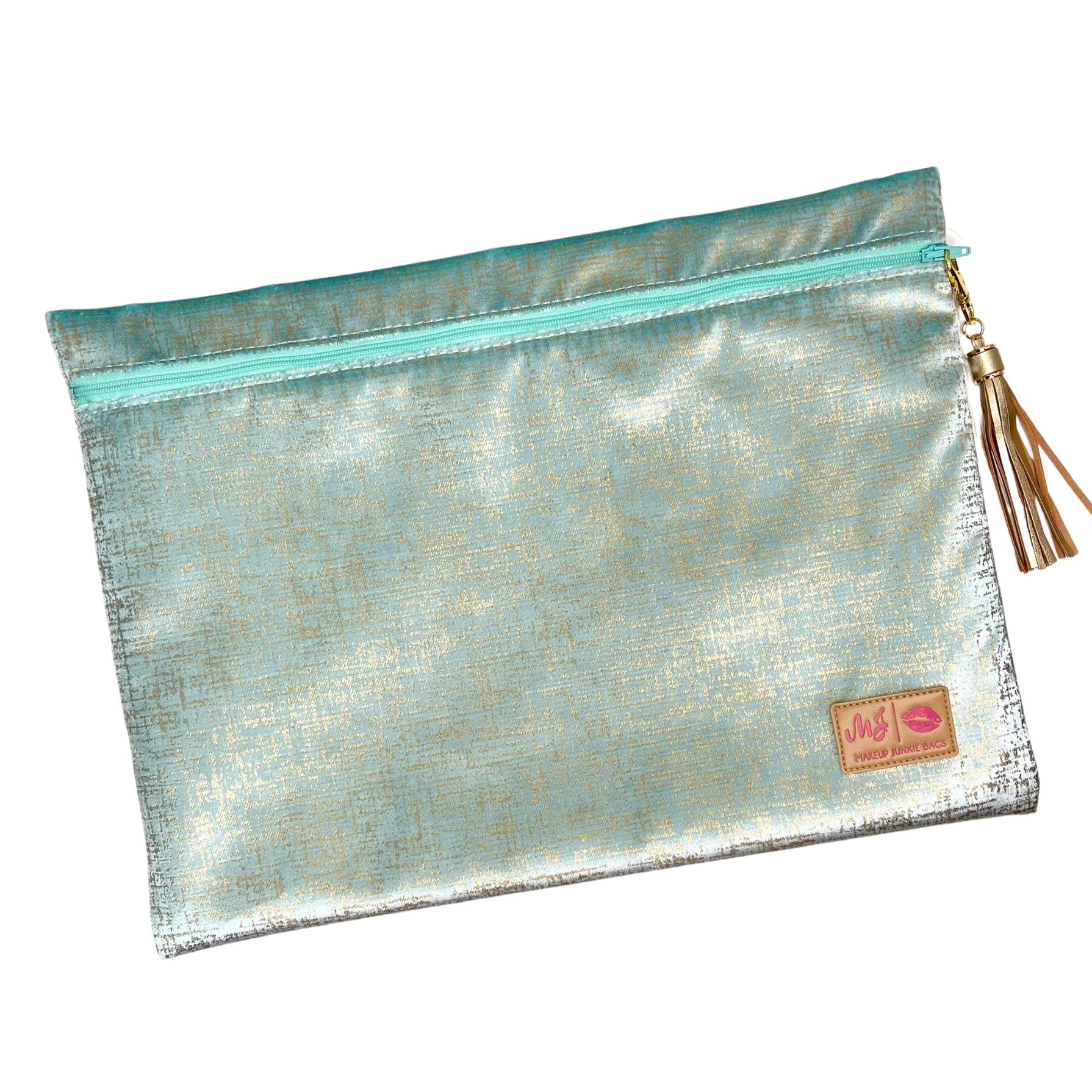 Metallic pouch with a tassel on a white background