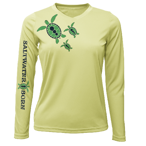 Light green long-sleeve shirt with turtle design and 'Saltwater Born' text on a white background