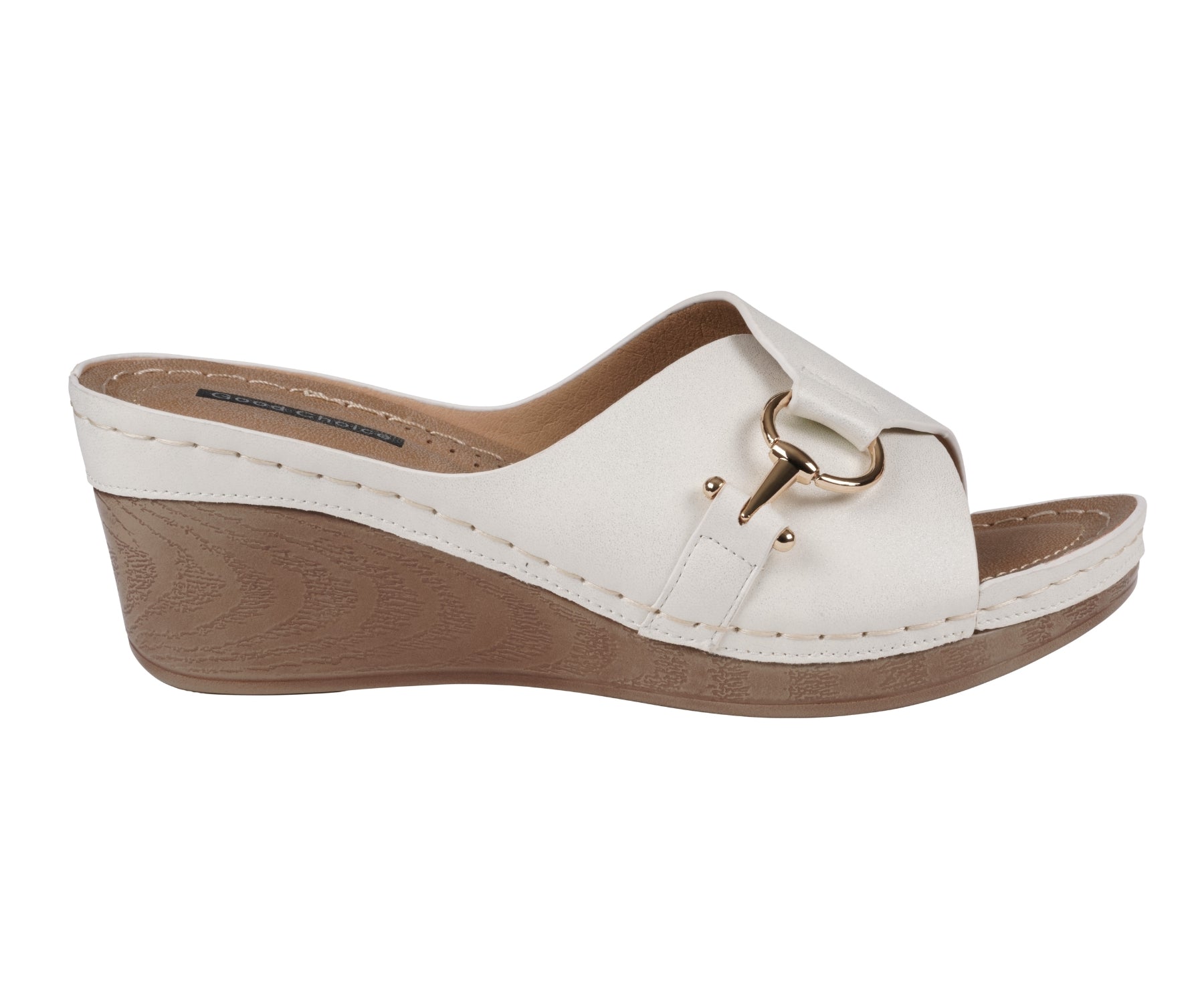 White wedge sandal with a gold buckle on a white background