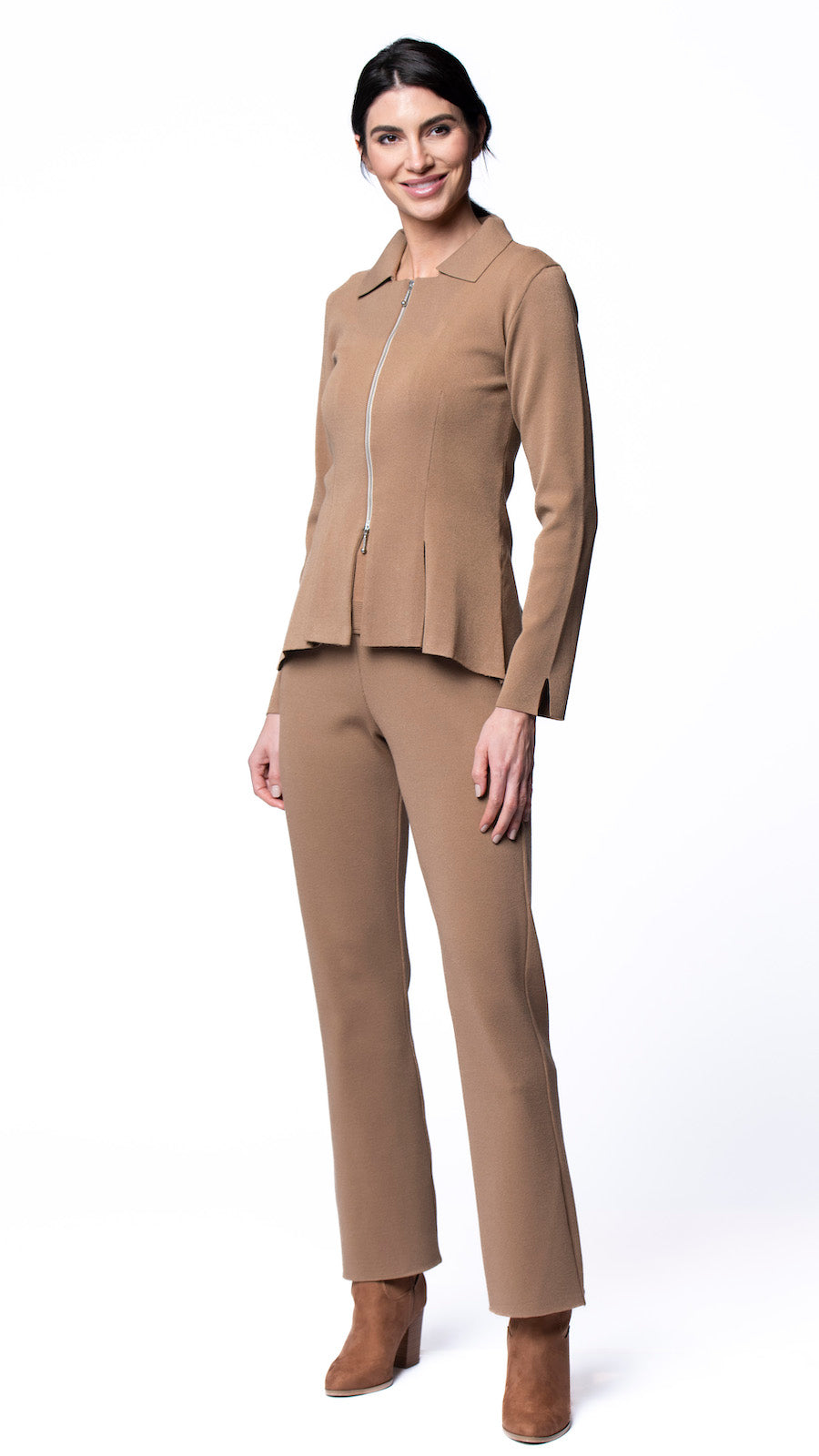 Woman wearing a beige suit on a white background