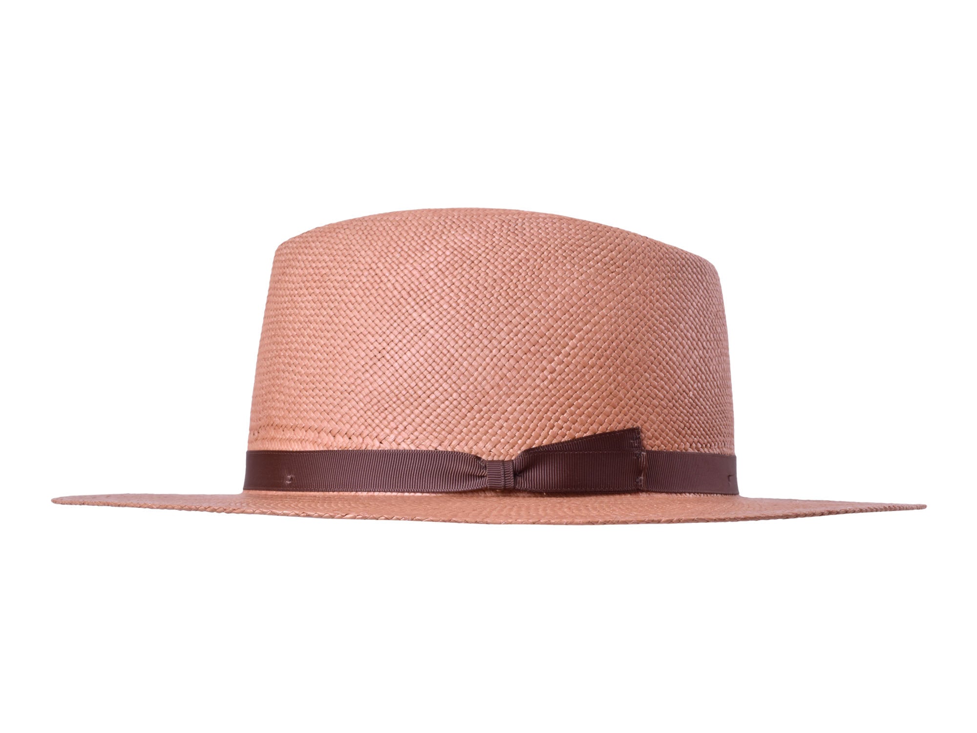 Pink straw hat with a brown ribbon on a white background