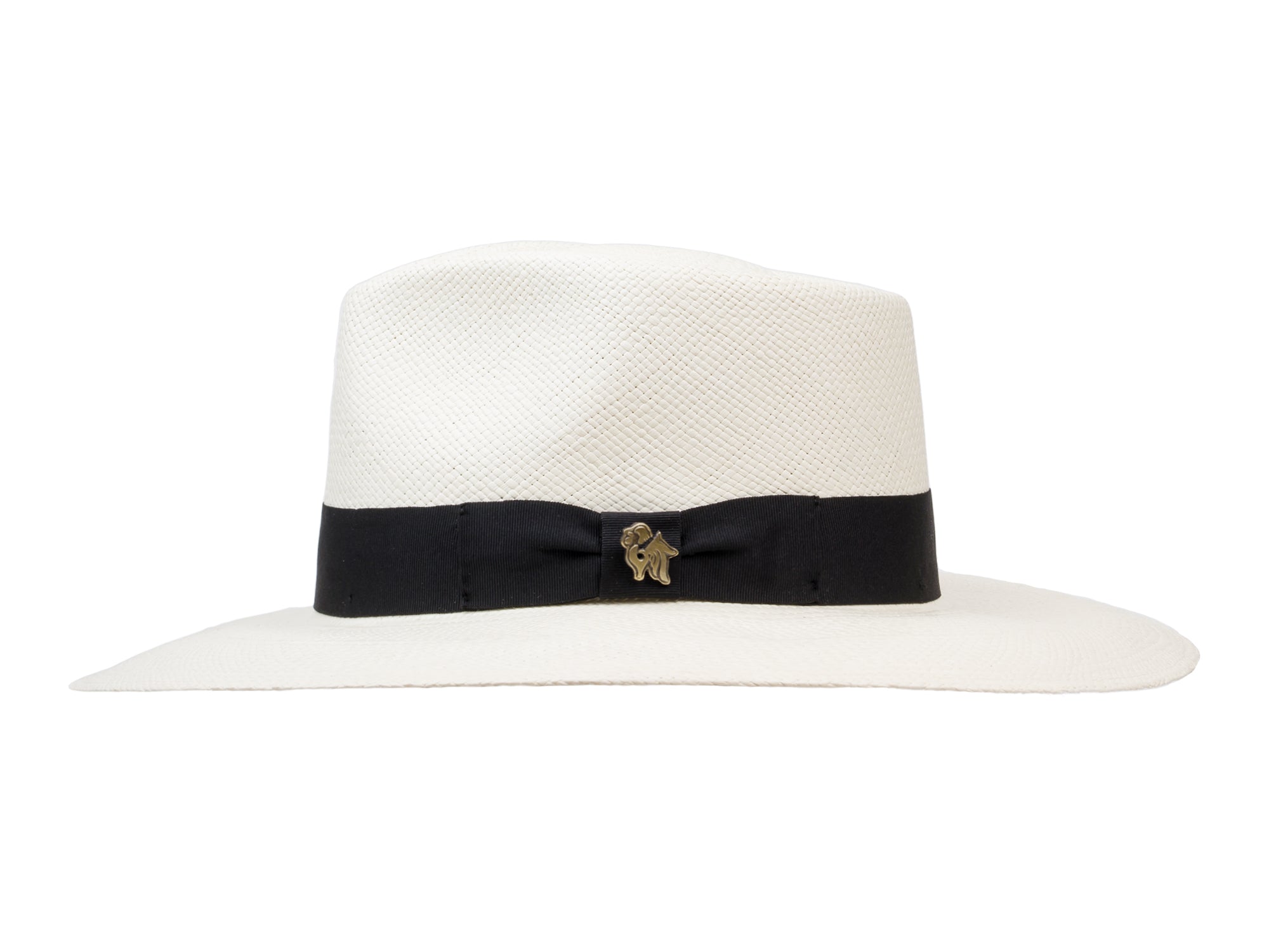 White Panama hat with a black band and gold emblem on a white background