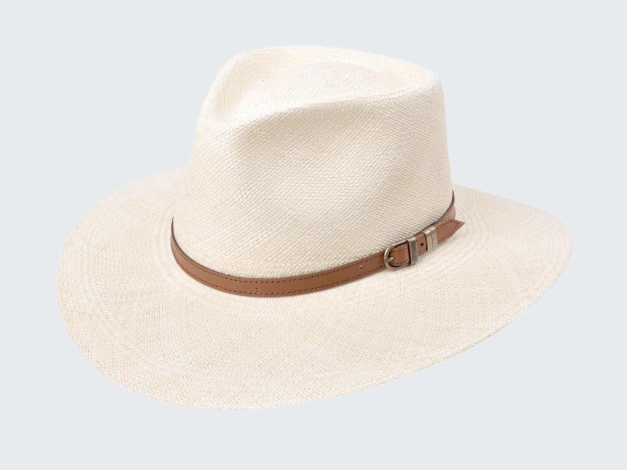 Beige straw hat with a brown band on a white background