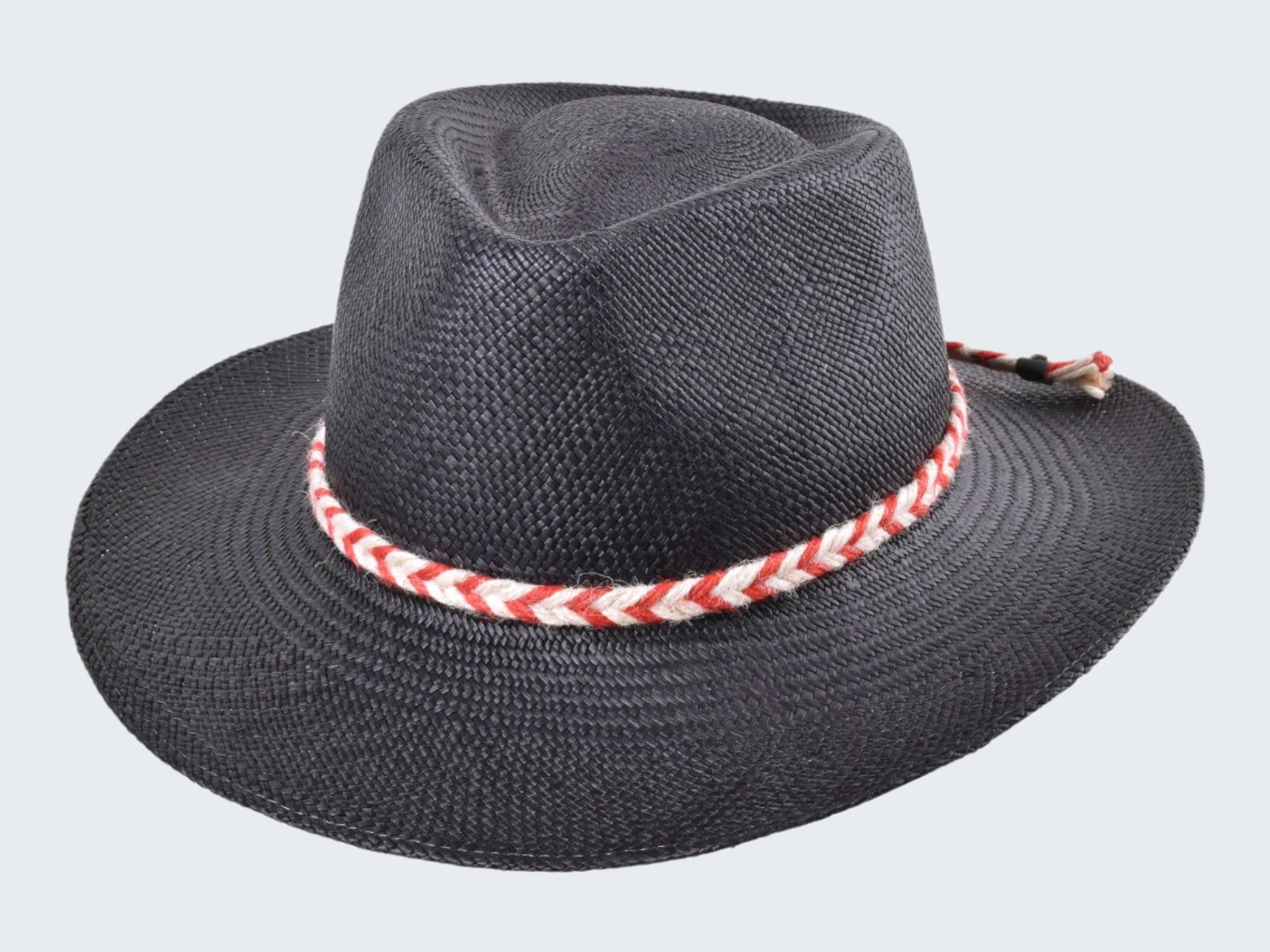 Black straw hat with a red and white striped band on a white background