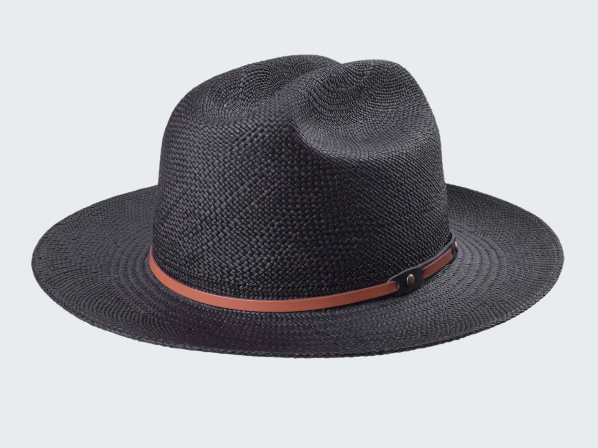 Black straw hat with a brown band on a white background