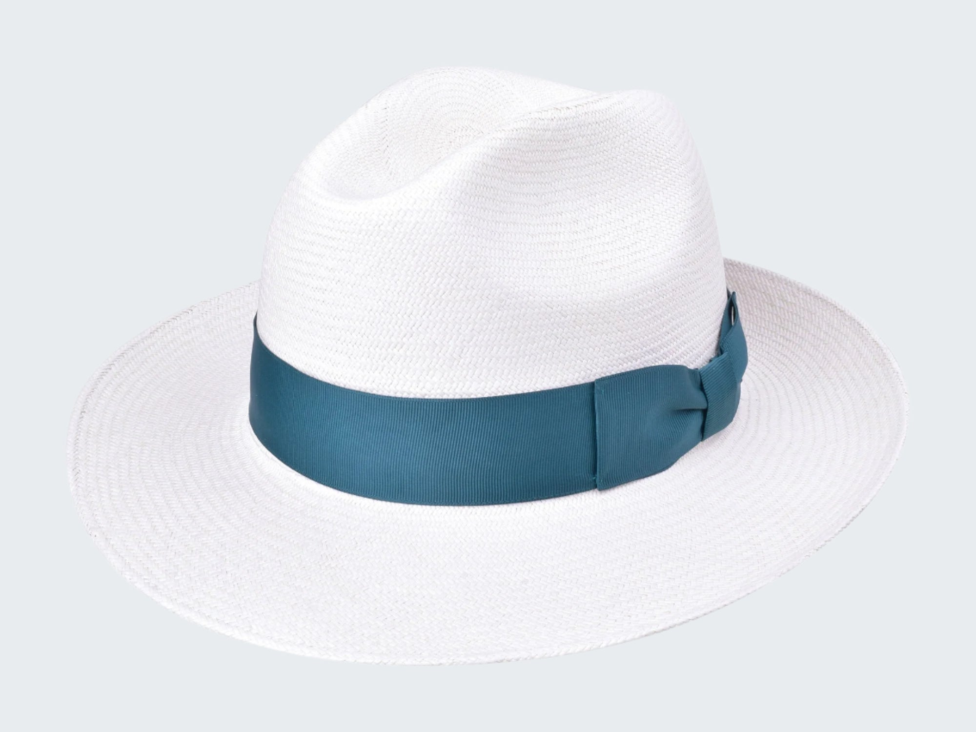 White straw hat with a blue band on a white background